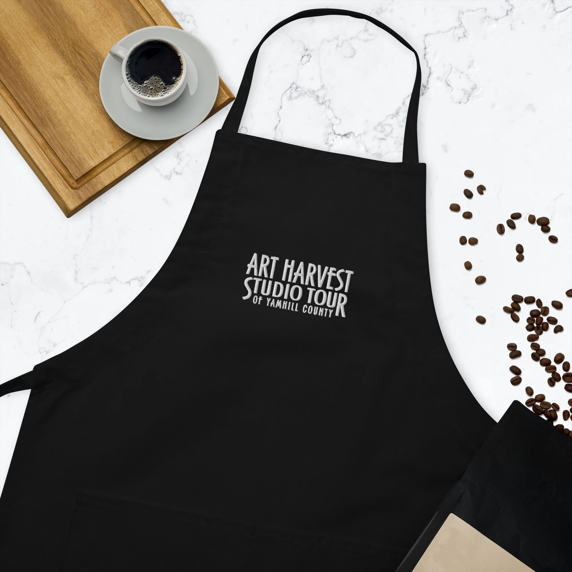 embroidered-apron-black-zoomed-in-661c2cceb15cf.jpg