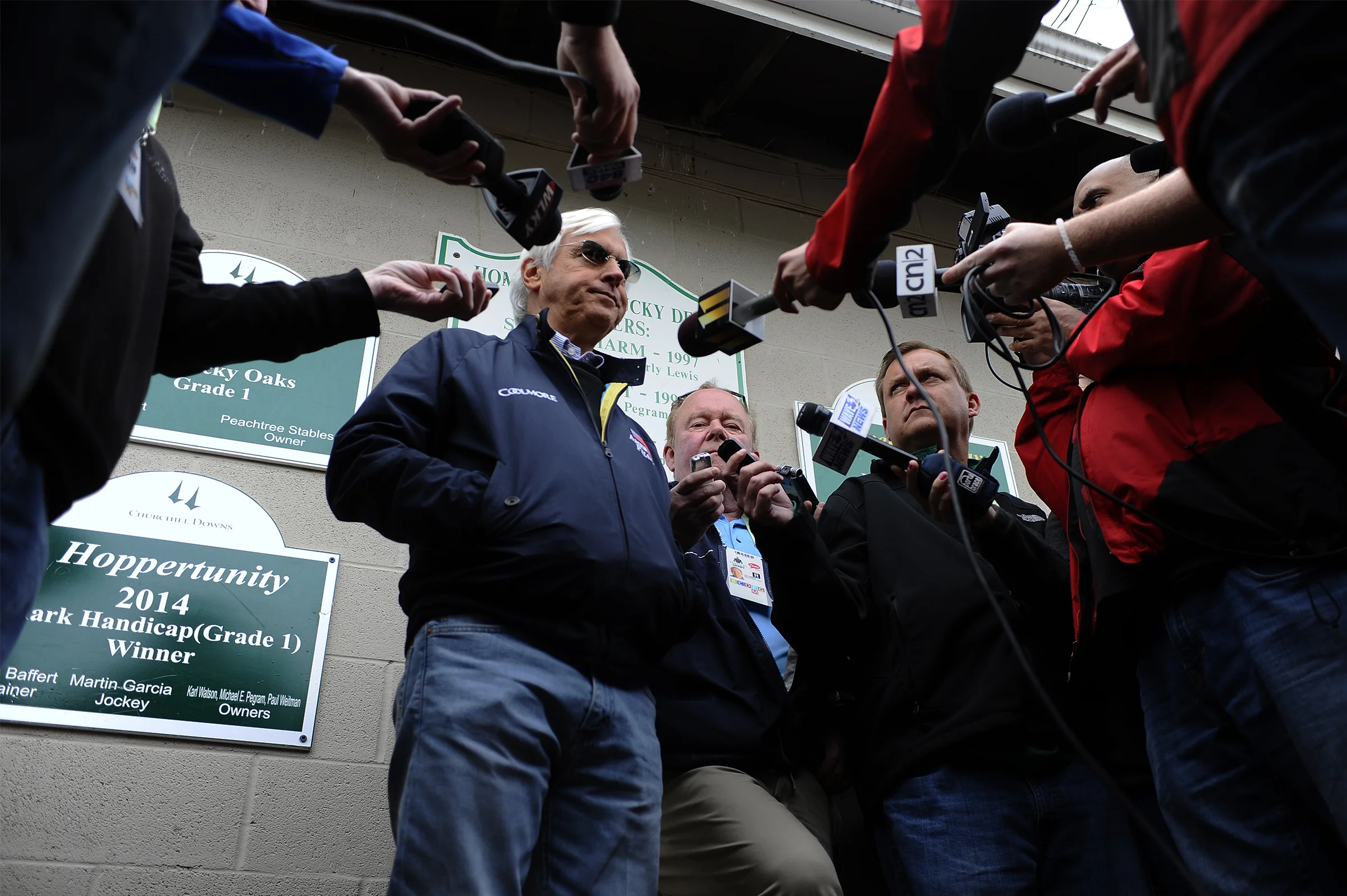 Legendary trainer Bob Baffert talks to the media outside of his stable on the backside of Churchill Downs on Wednesday, May 4, 2016.