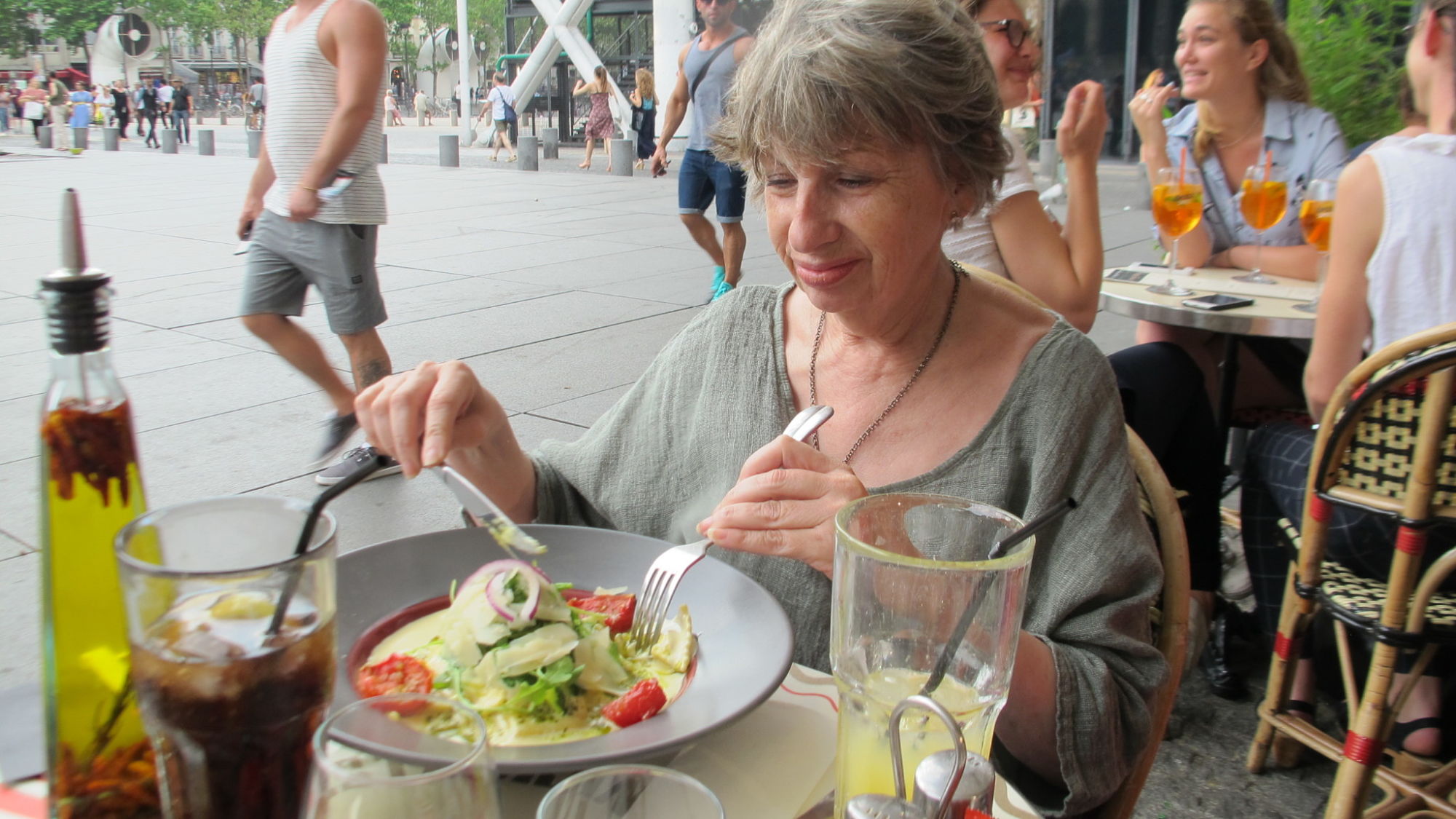 A guest enjoying a salad at a café near "Beaubourg," The Museum of Modern Art. 