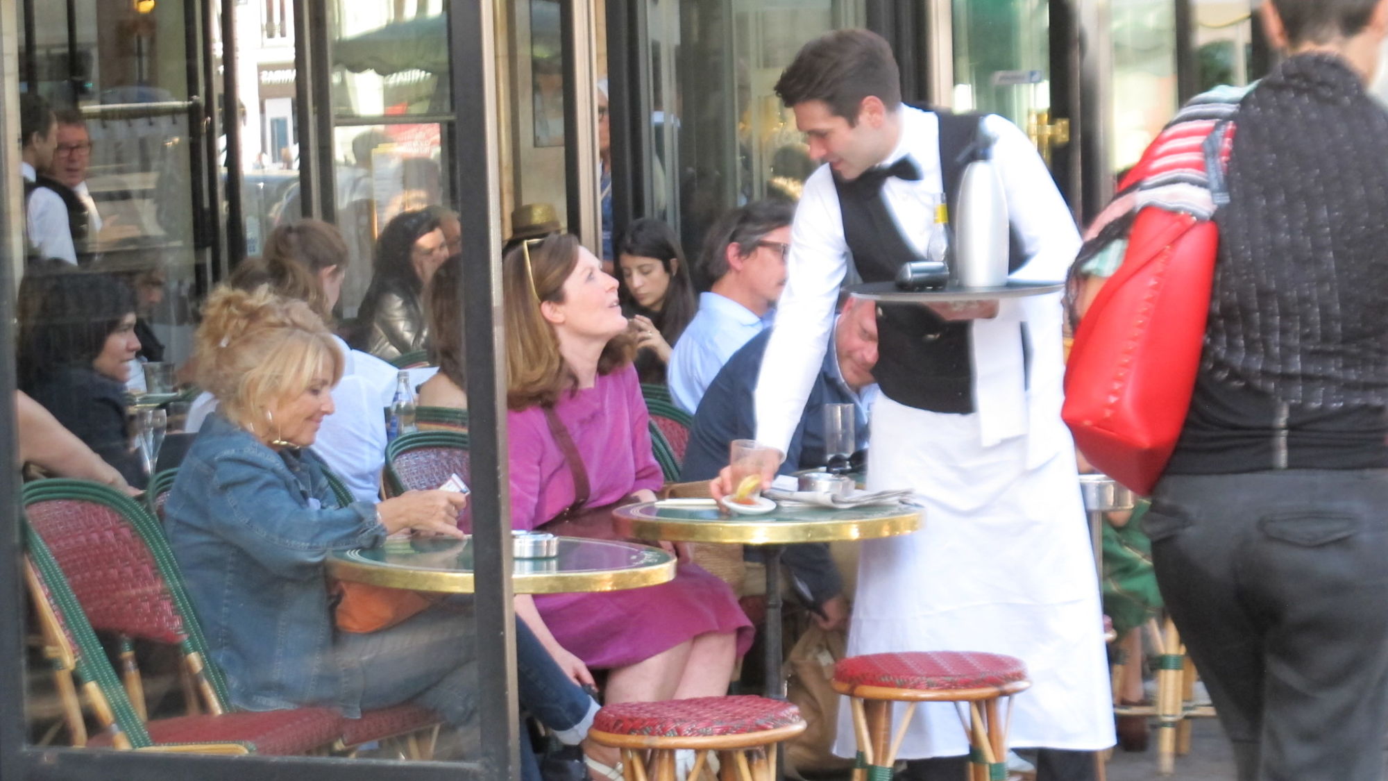 Guests at a café in the Saint Germain des Prés area of Paris. 