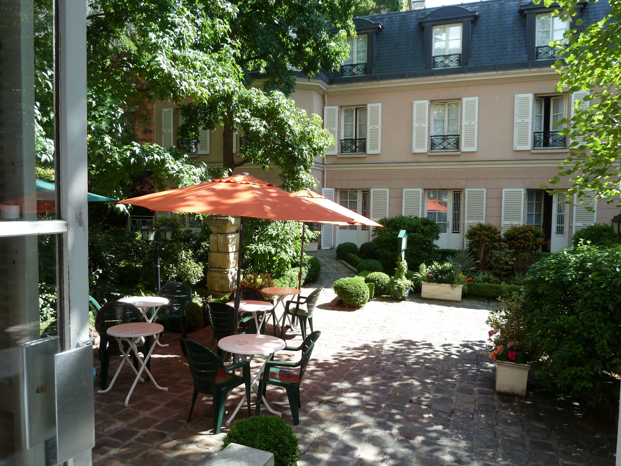 Shady garden of our hotel in Paris.