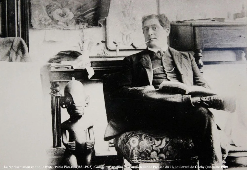 Guillaume Apollinaire in Picasso's studio, photo by Picasso.