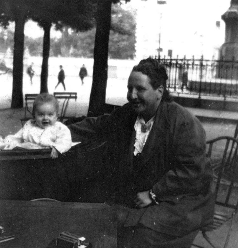 Gertrude Stein in the Luxembourg Gardens in Paris with Ernest Hemingway's first son Jack or "Bumby."