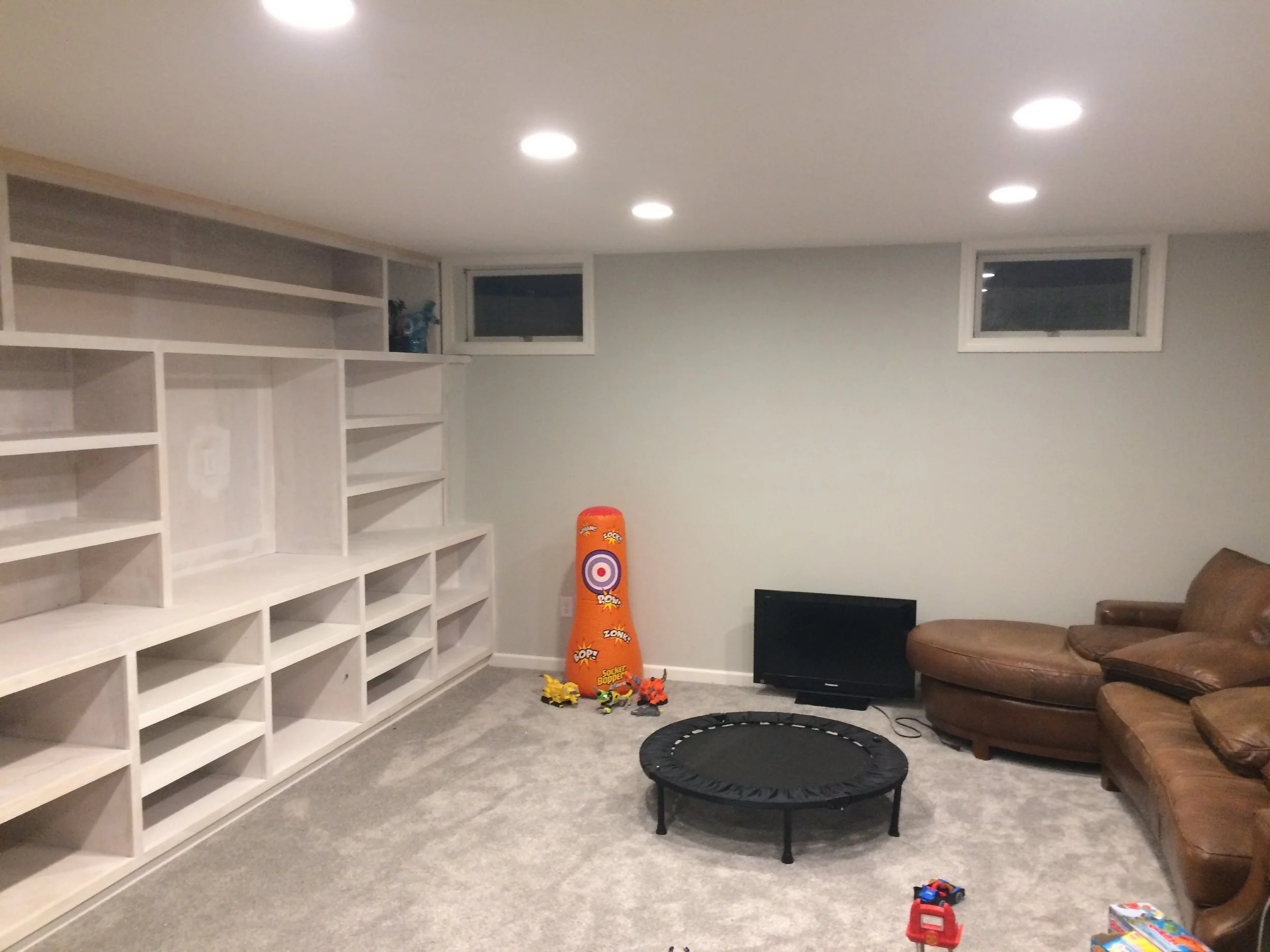 Custom basement renovation plus custom built-ins (waiting for paint)