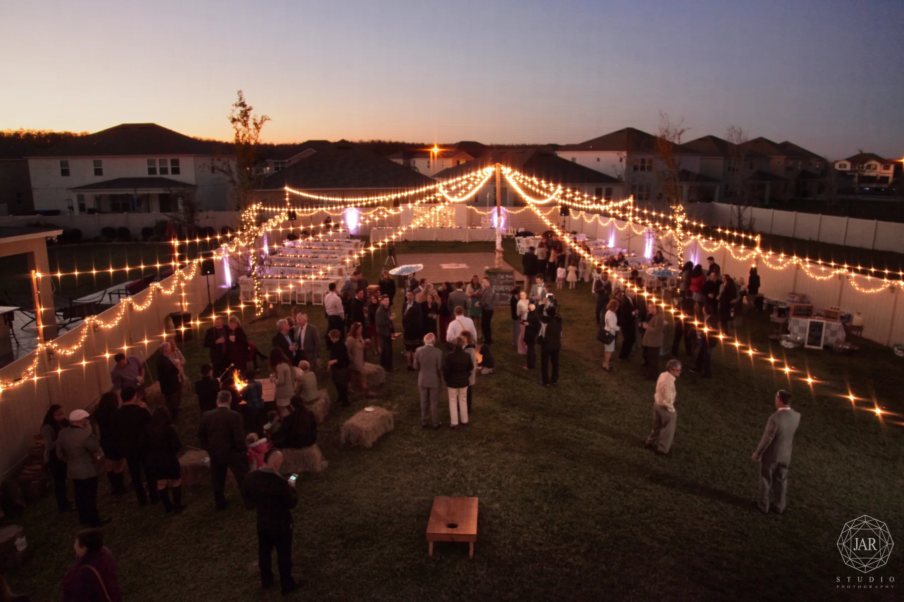41-backyard-wedding-ideas-string-lights-jarstudio.JPG