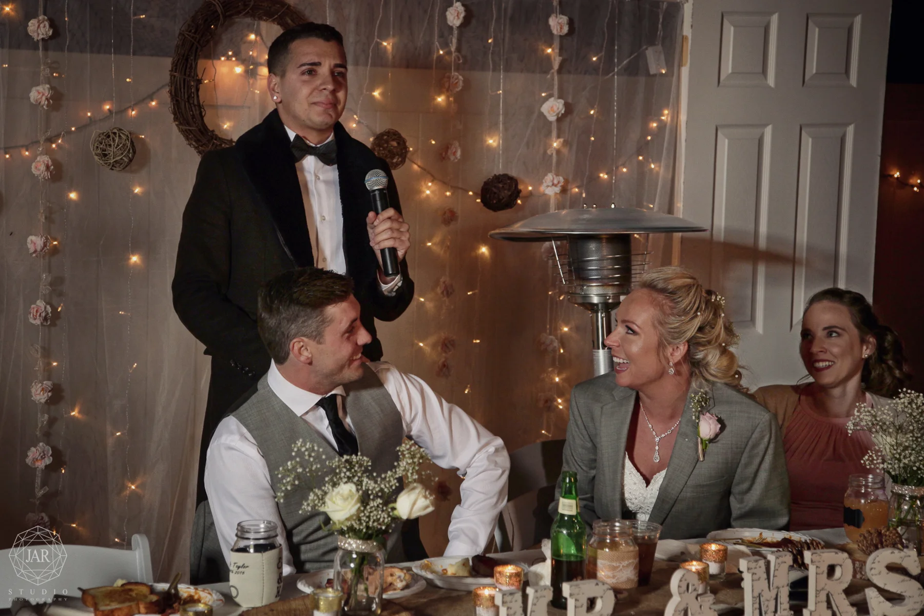 44-wedding-toast-string-lights-ideas-jarstudio.JPG