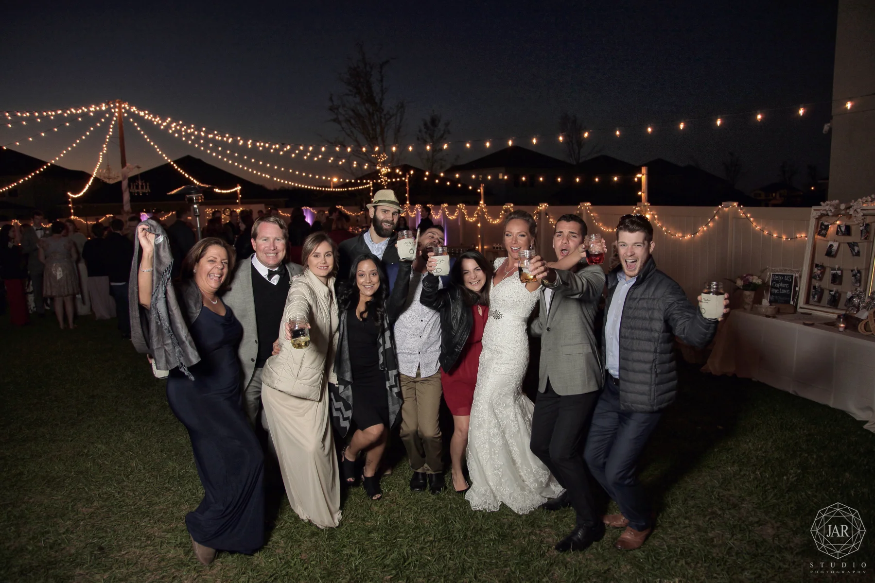 44-patio-wedding-party-string-lights-jarstudio.JPG