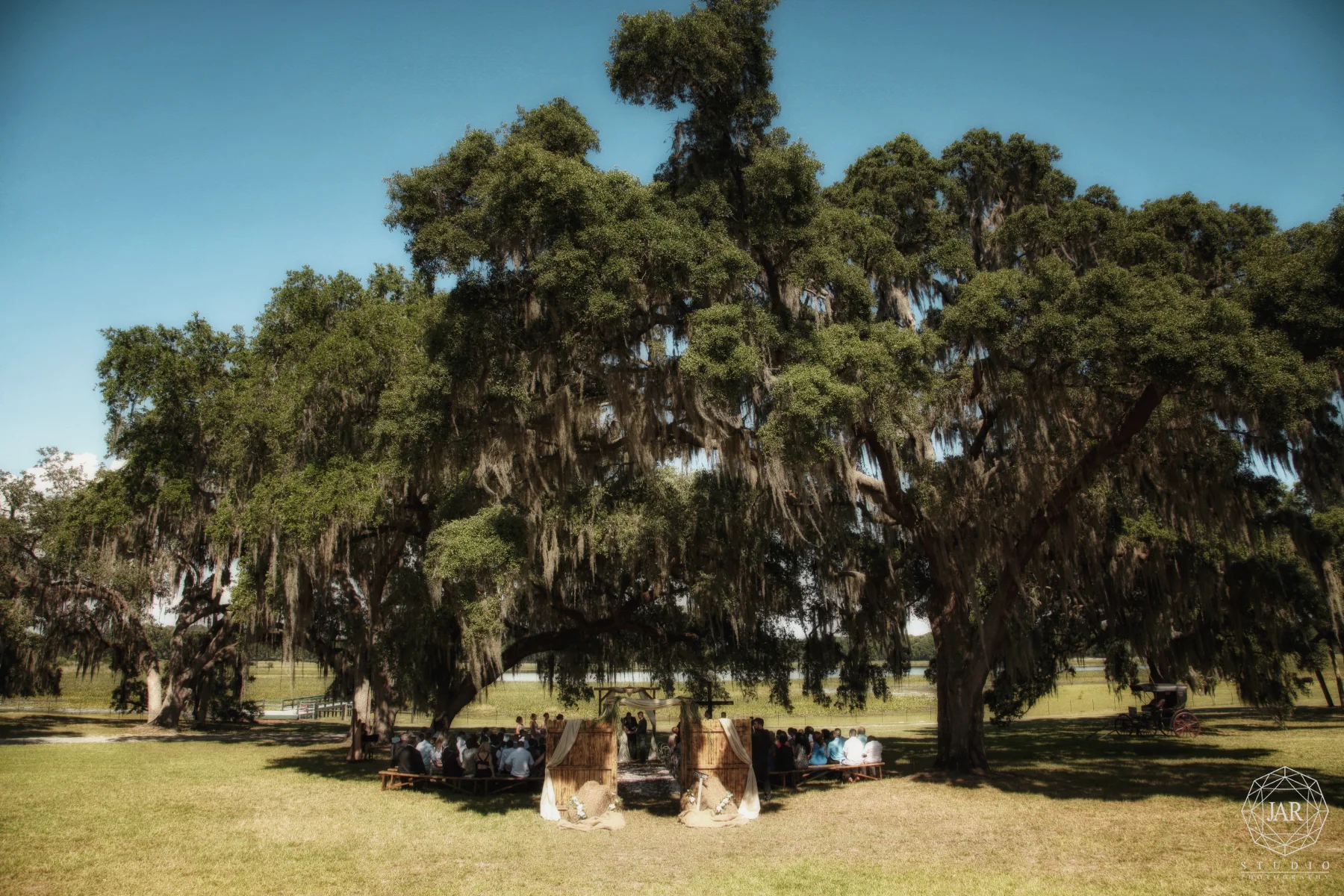 23-ceremony-under-tree-lakeside-ranch-photography-jarstudio.JPG