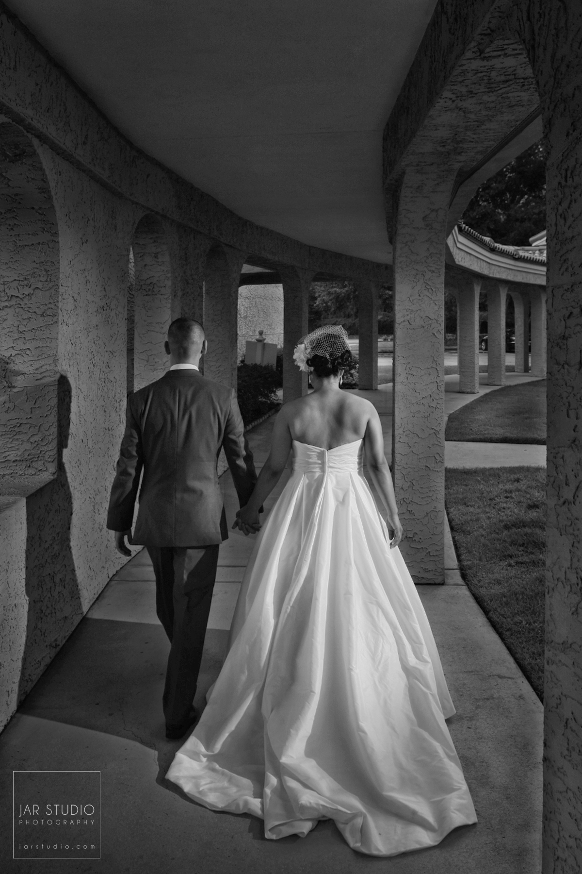 22-bride-groom-walking-to-reception-orlando-wedding-venues.JPG