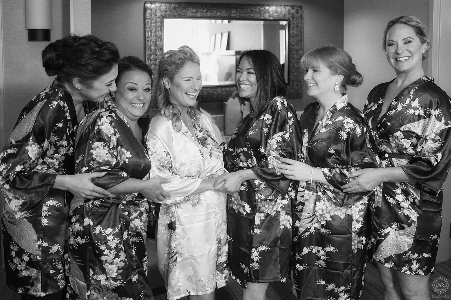01-bride-getting-ready-fun-with-bridesmaids-orlando-photographer.JPG