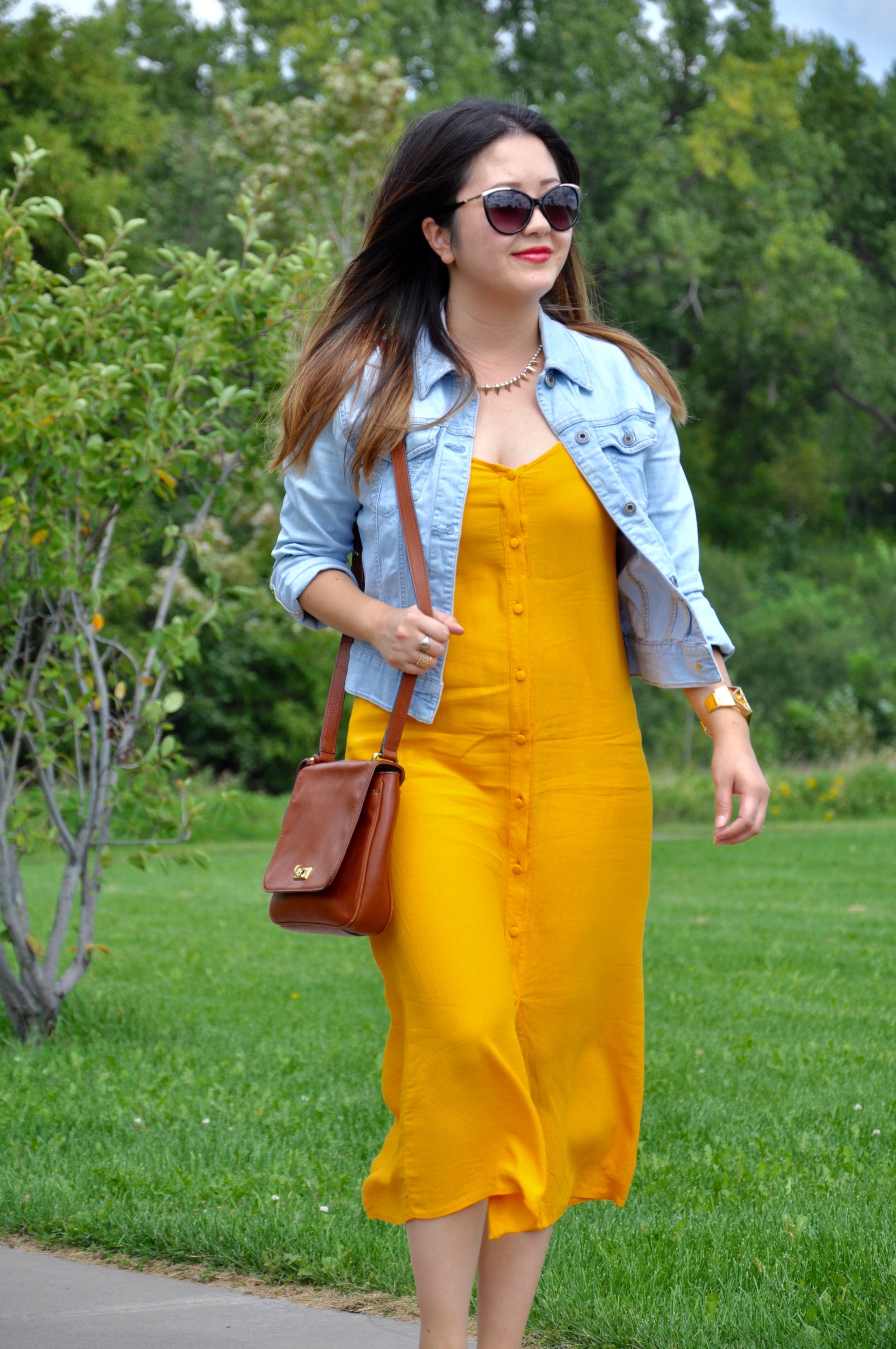 Dress: Topshop slip dress similar here ; Denim Jacket: Gap light wash jacket similar here ; Bag: Fossil crossbody bag similar here ; Shoes: Tulum Trek Tan Heeled Sandals