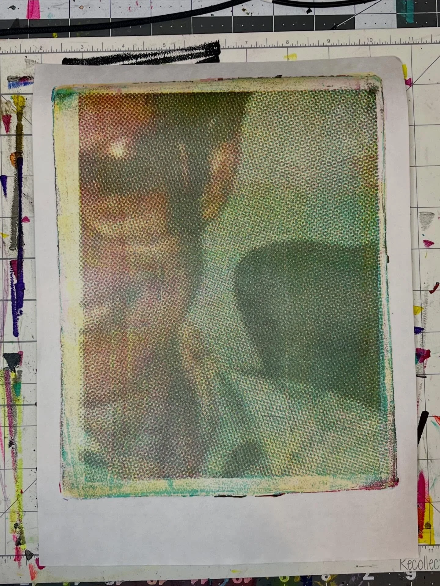 working on a very large piece with an image tiled with 28 cmyk gelatin prints!
