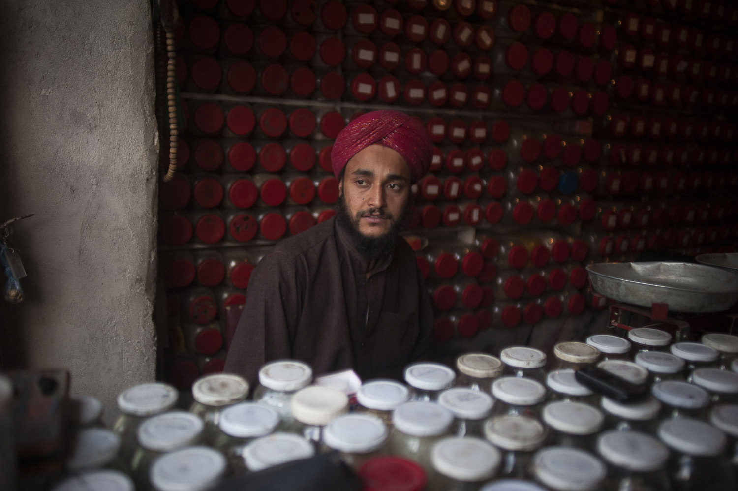  A sikh medicine man in his shop in downtown Kabul, Afghanistan. 