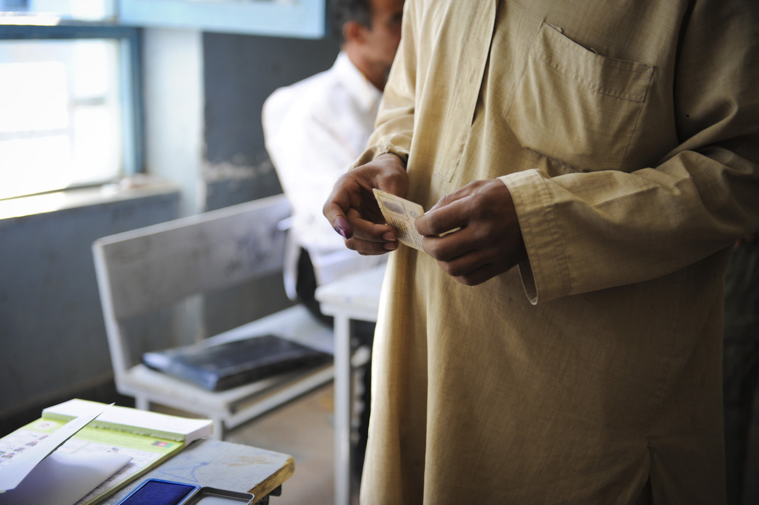  Afghans vote at schools across Kabul Afghanistan on August 20th, 2009. the country later went on to elect incumbent president Hamid Karzai after months of debate over a tampered election. 