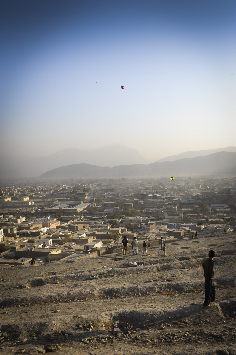  Afghans gather on a Friday on Nadir Shah Hill, or Kite Hill- to fly paper kites and battle others in a traditional match. When a Kite is cut children with long brooms have to catch the kites before their prize blows away. Kite flying is a popular re