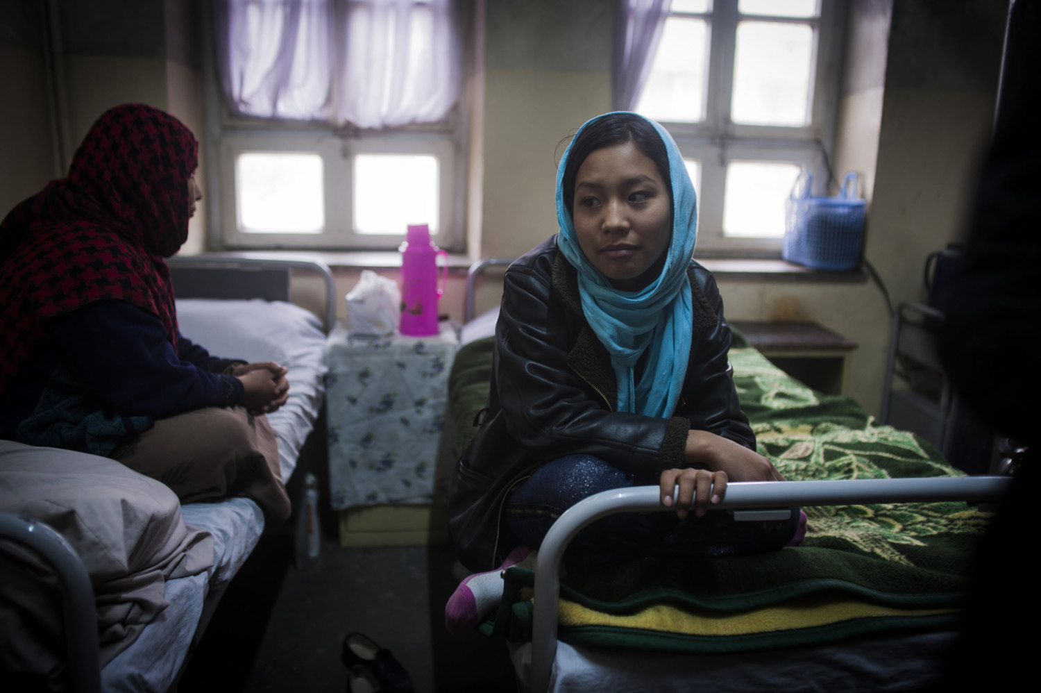  Fatima was brought here after being raped. Doctors note that she is under extreme stress. Her sister (on left) lives at the hospital to care for her. This is common in Afghanistan and most patients have a well relative residing with them 24 hours a 