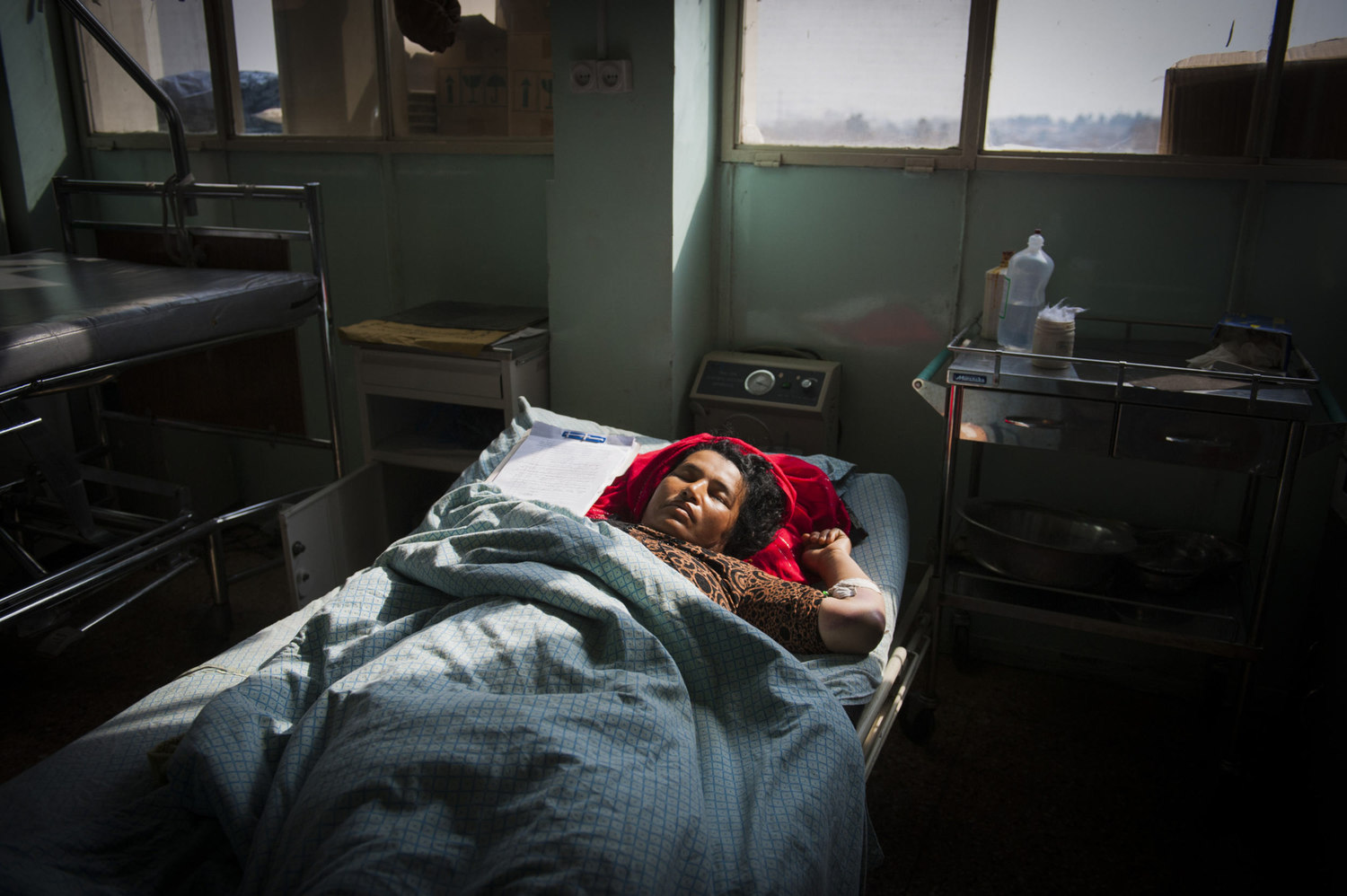  Nuraya rests in the Womens ICU of Wazir Akbahan hospital after a car accident. After five days she has yet to regain consciousness and has broken both her legs and arm.  Non-fatal accidents in Afghanistan often lead to death due to inadequate medica