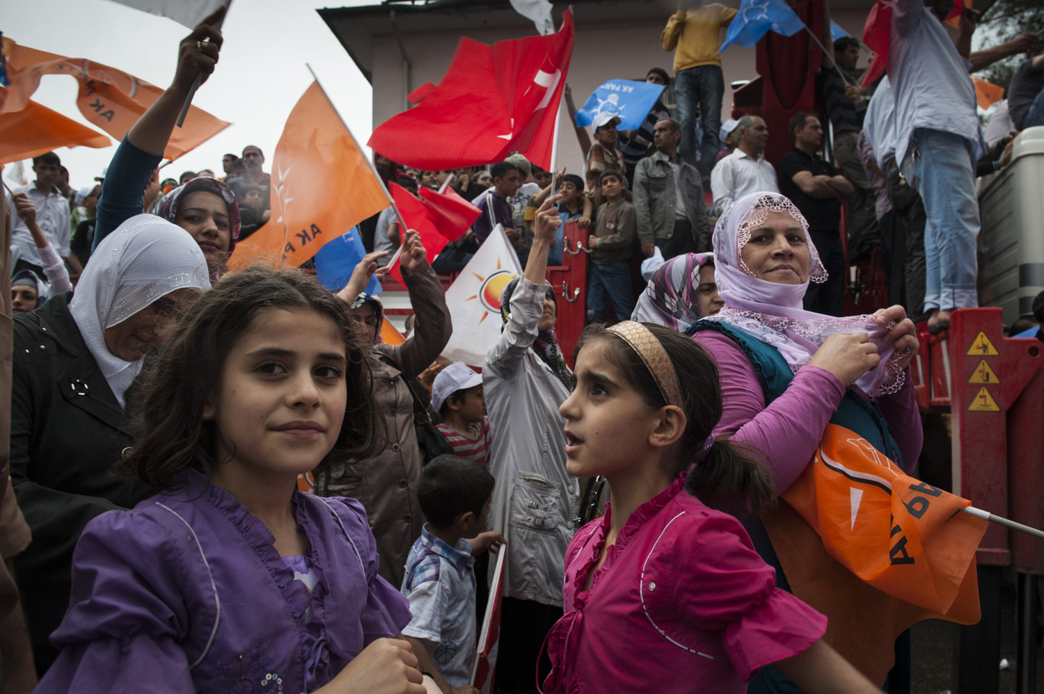  Supporters of the Justice and Development Party (AK Parti) in Diyarbakir Turkey come together to rally for incumbent Prime Minister Recep Tayyip Erdogan in the 2011 general elections.  