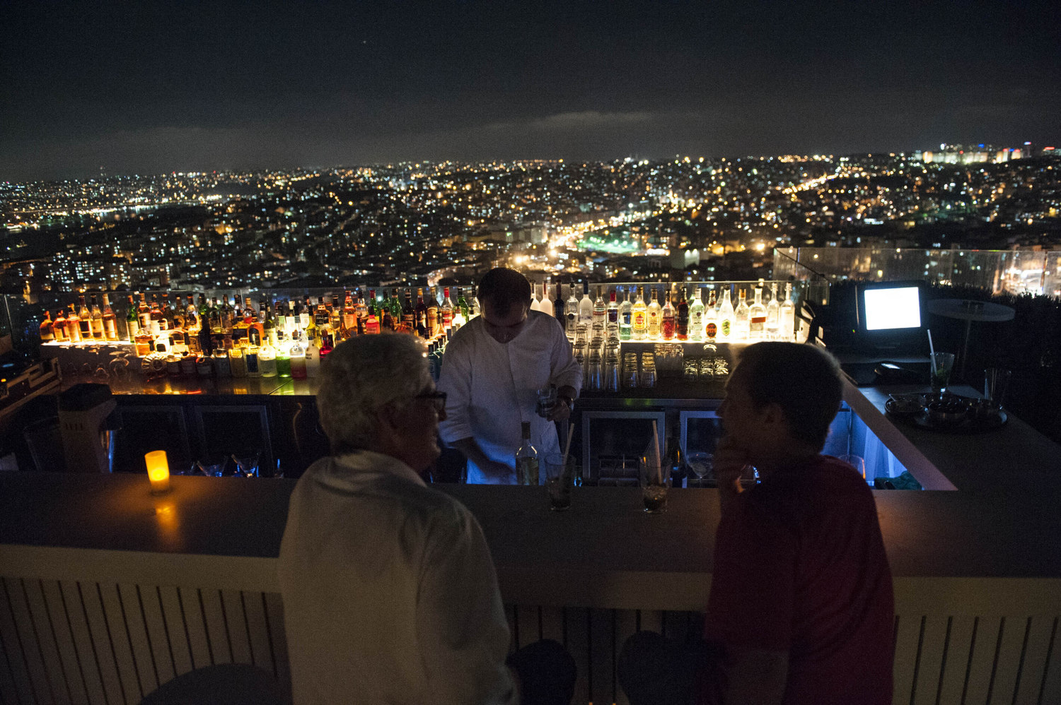  Patrons of Mikla's rooftop bar at the Marmara Pera Hotel. 
