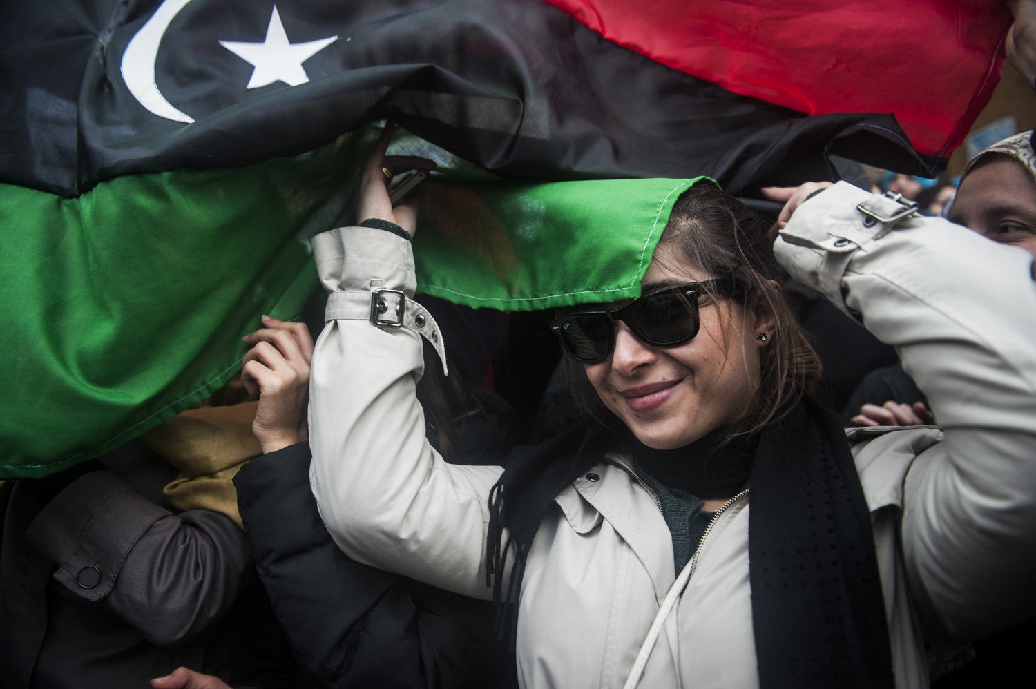  Libyans gather in the main square of Benghazi, Libya to celebrate the cities overthrow of Col. Gaddafi's 41 year rule. Cities in the east of Libya have all fallen to the resistance forces and efforts to sent up a temporary government are in action. 