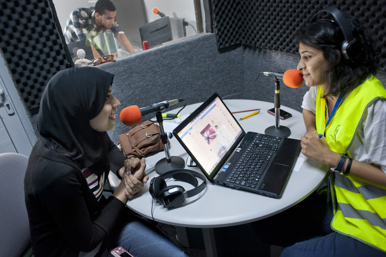  Radio host Ayo interviews Issraa Murabit after she voted on July 7th, 2012 in one of Tripoli's english language stations Tripoli FM. After 42 years of Muammar Gaddafi's reign, Libyans are participating in the first democratic election since 1969.  