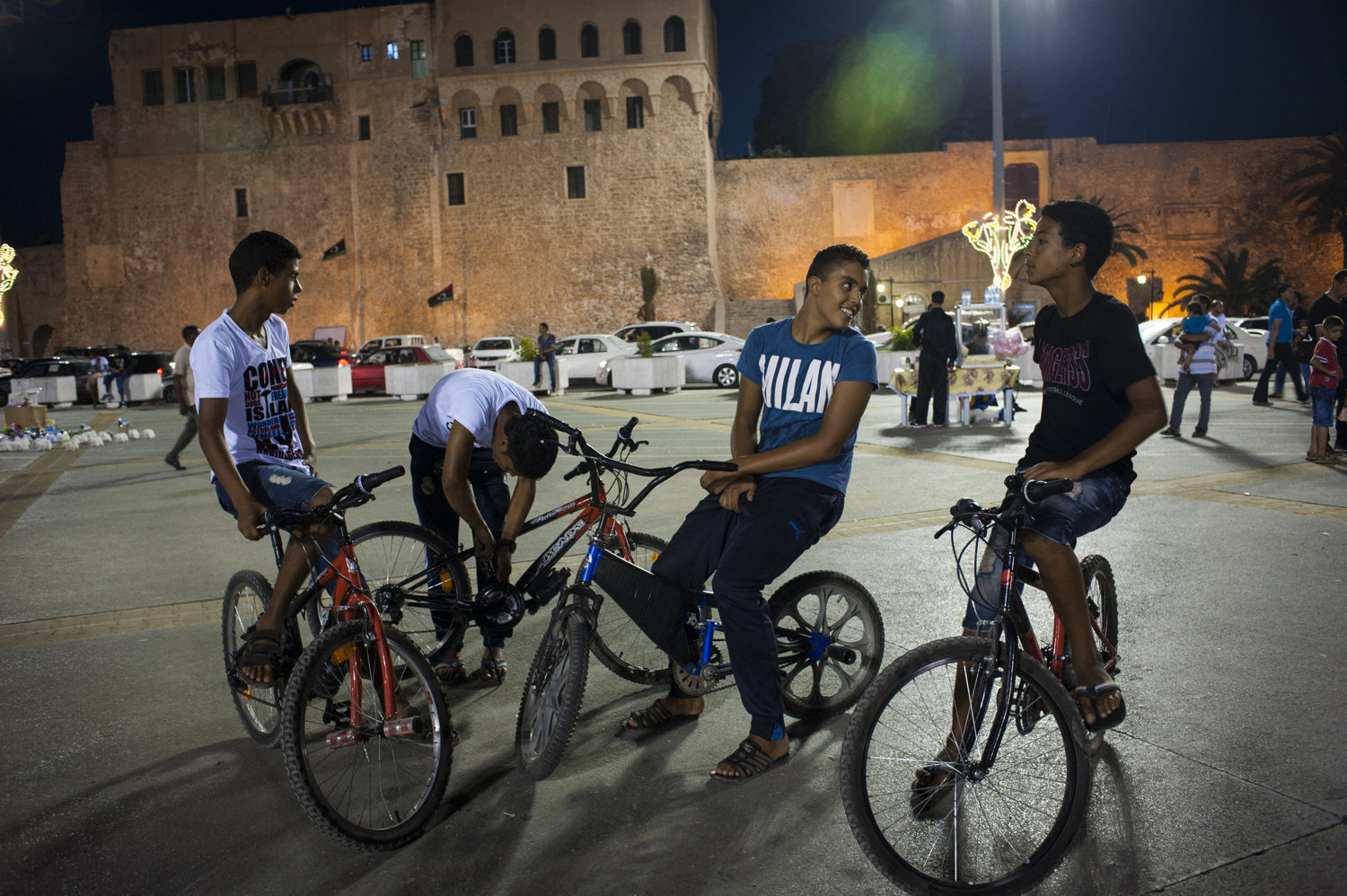  Young boys on bikes in Martyr Square in Tripoli, Libya. 42 years after the reign of Col. Muammar Gaddafi and a violent civil war Libya is waking up to a new and free country. With civil services and the countries infrastructure in ruins Libyans stru