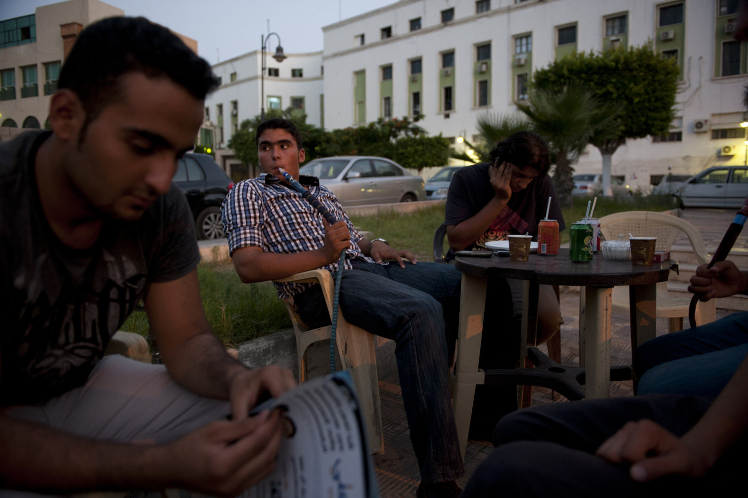  Medical students talk in a downtown cafe on July 10th, 2012 in Tripoli, Libya.
 