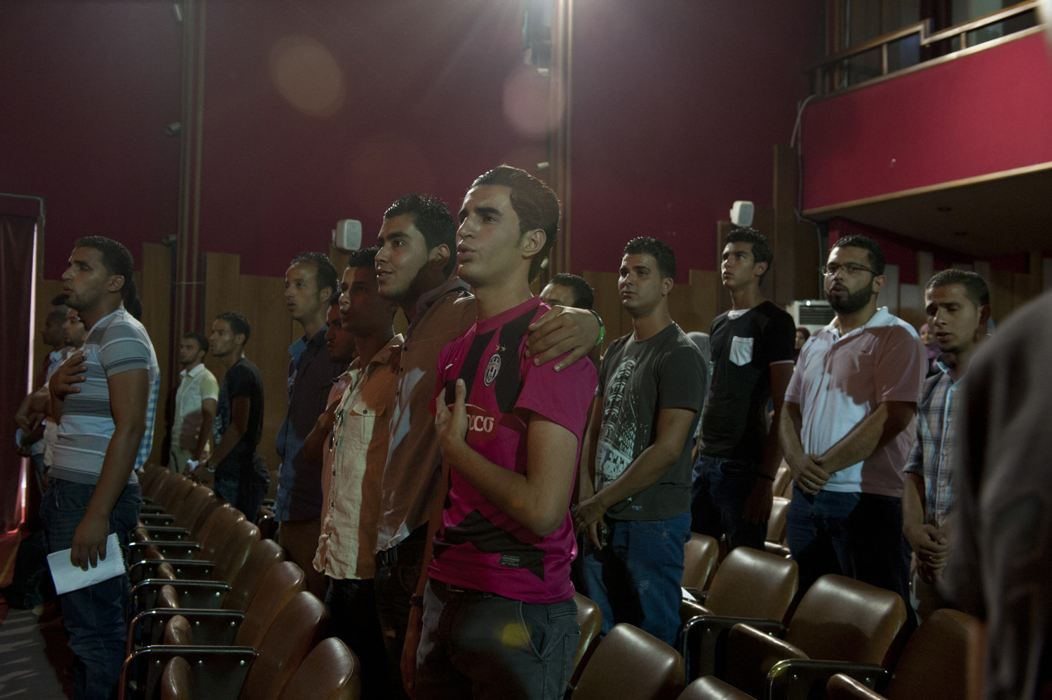  Students at Tripoli University sing the national anthem and attend a meeting of the elected Student Council on July 12th 2012.

 