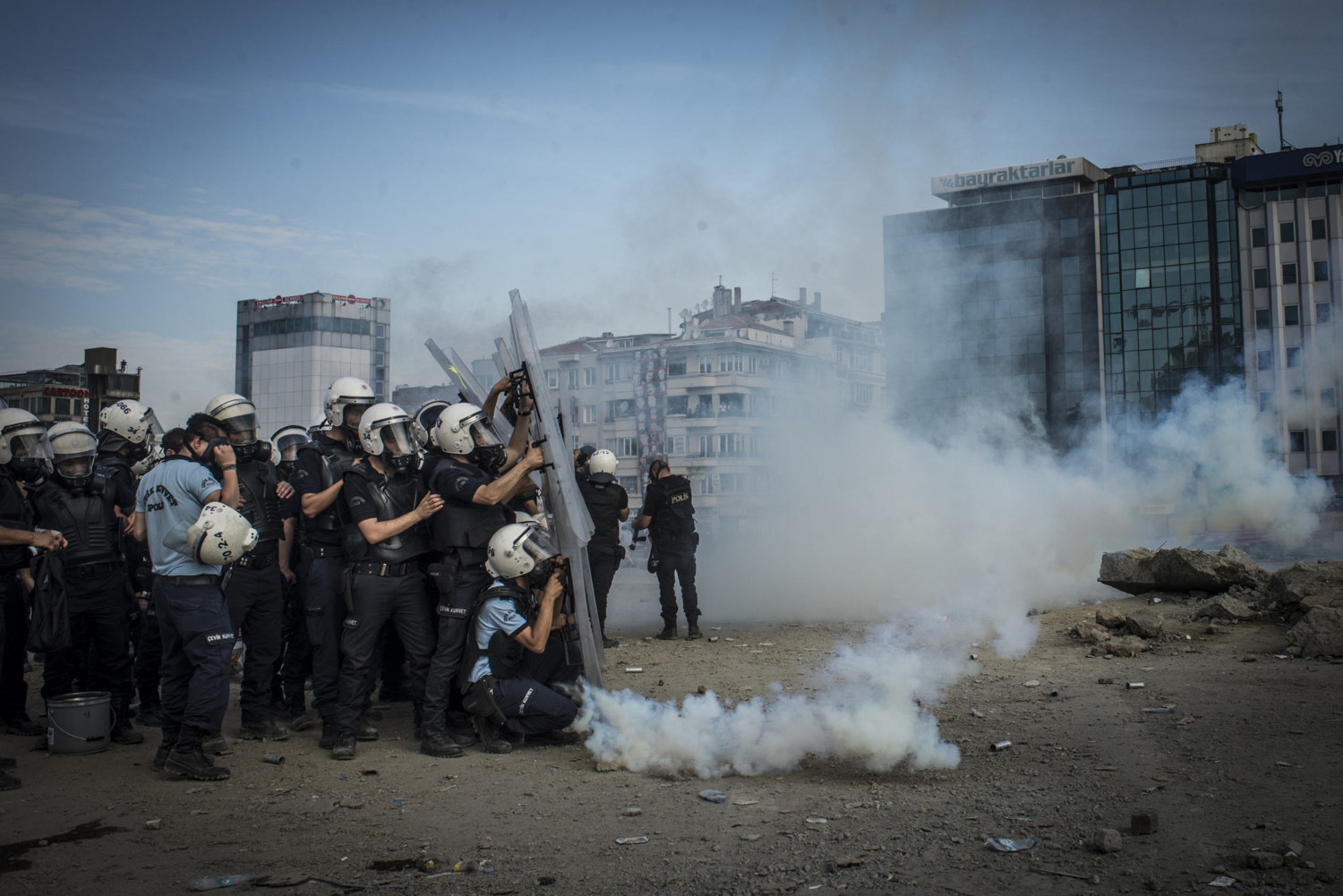  As the police take back Taksim square from the protesters, tear gas canisters originally thrown at the protesters are returned to the police on June 11, 2013 in Istanbul, Turkey. 