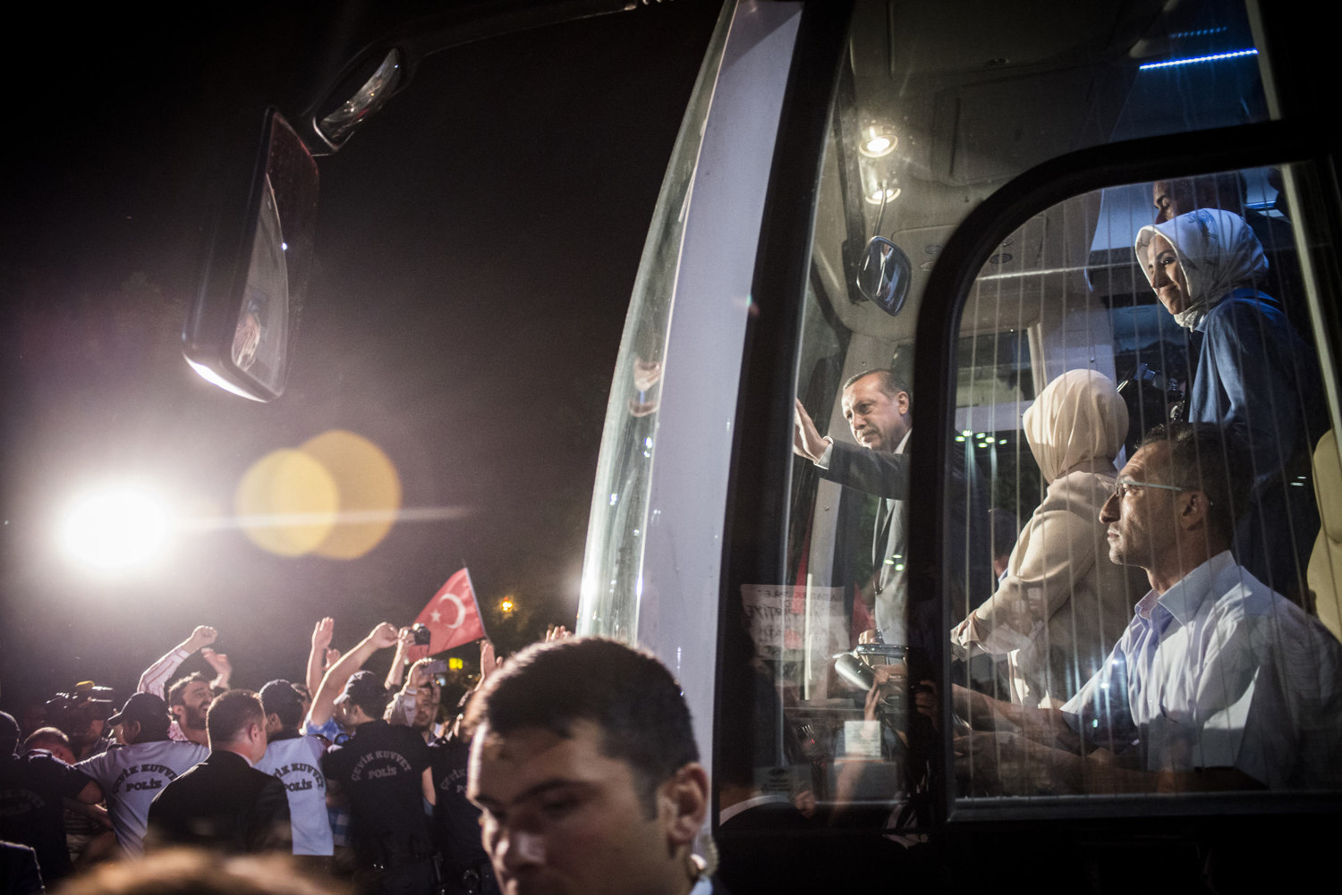  Prime Minister Erdogan and his wife Emine as they leave the airport. AKP Supporters at Ataturk International Airport come out by the thousands to support Prime Minister Erdogan on his return from Tunisia. In a speech thanking his supporters he pledg