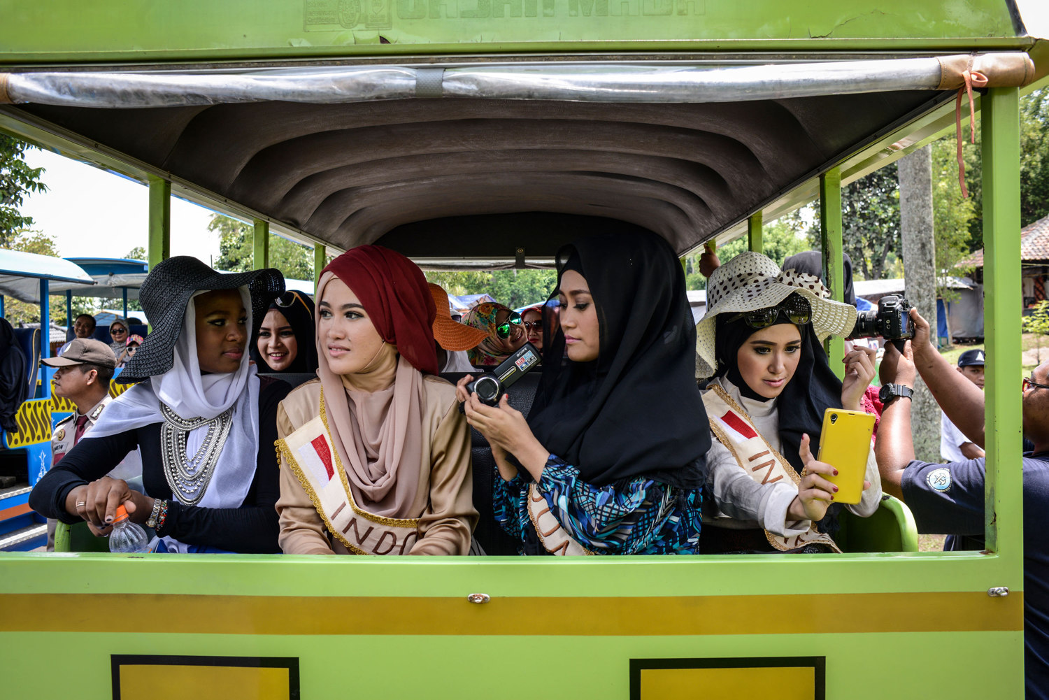  The Miss Muslimah finalists visit Borobudur,  a 9th-century Mahayana Buddhist Temple outside of Yogakarta, Indonesia. Miss Muslimah 2014 an award competition in Indonesia, which intends to be the opposite of a beauty pageant. 