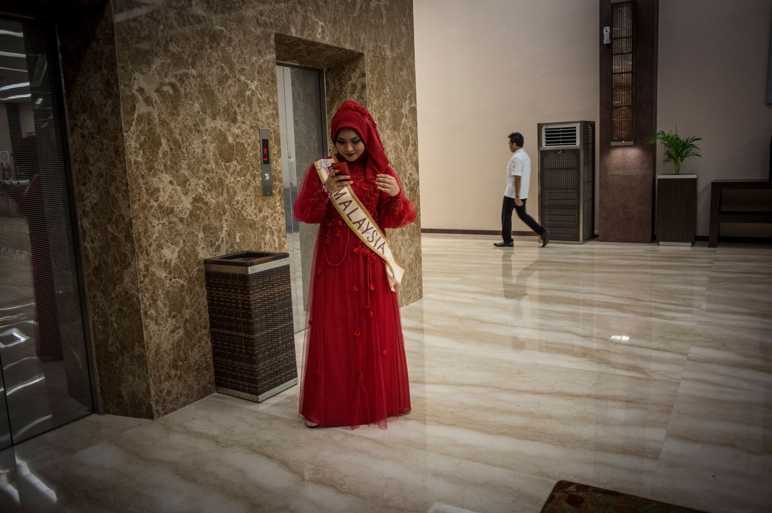  Nur Khairunnisa of Malaysia on the elevator before the ball on November 19th, 2014 in Yogakarta, Indonesia. 