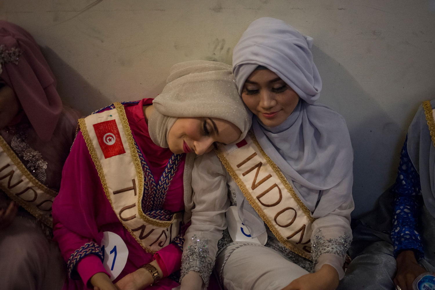  At The Grand Finale of the Miss Muslimah World Competition, backstage the girls are anxious and exhausted on November 21st, 2014 in Yogakarta, Indonesia. Pictured Muss Tunisia, Fatma Ben Guefrache, and Primadhita Rahma, one of the Indonesian finalis