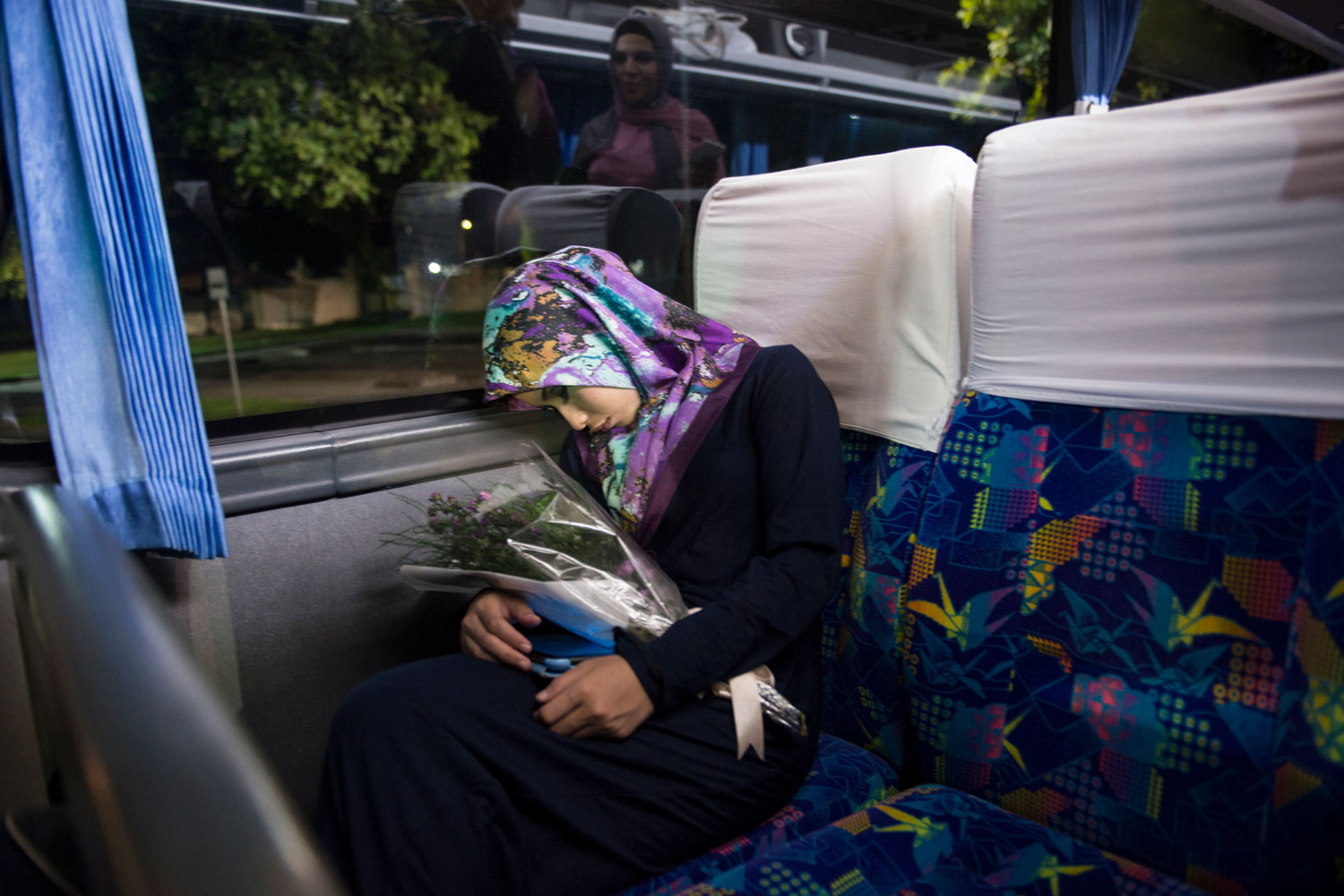  Miss Malaysia falls asleep while holding her flowers on November 21st, 2014 in Yogakarta, Indonesia. 