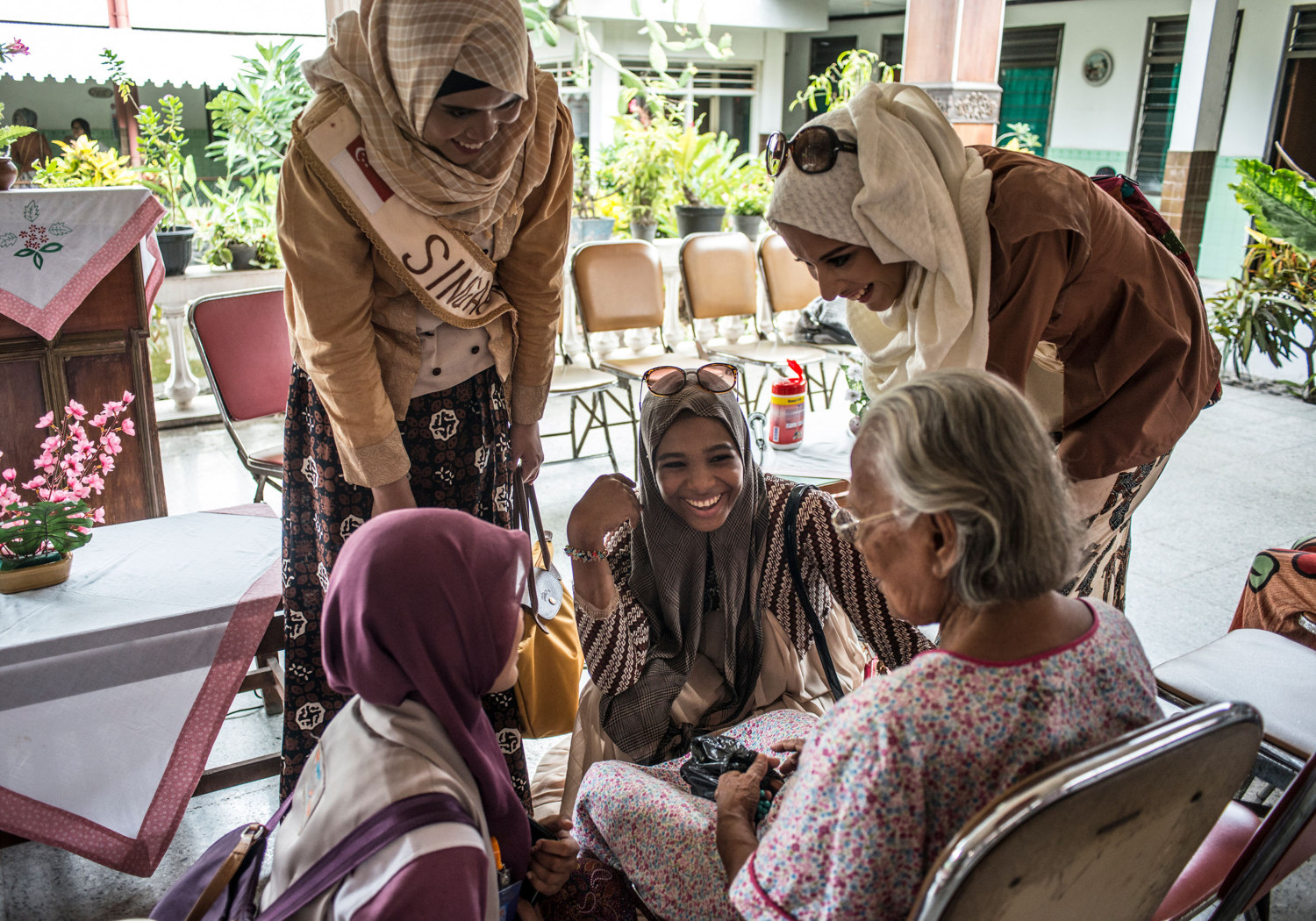  At an elderly home, the girls are tested on their charity and compassion. 
 