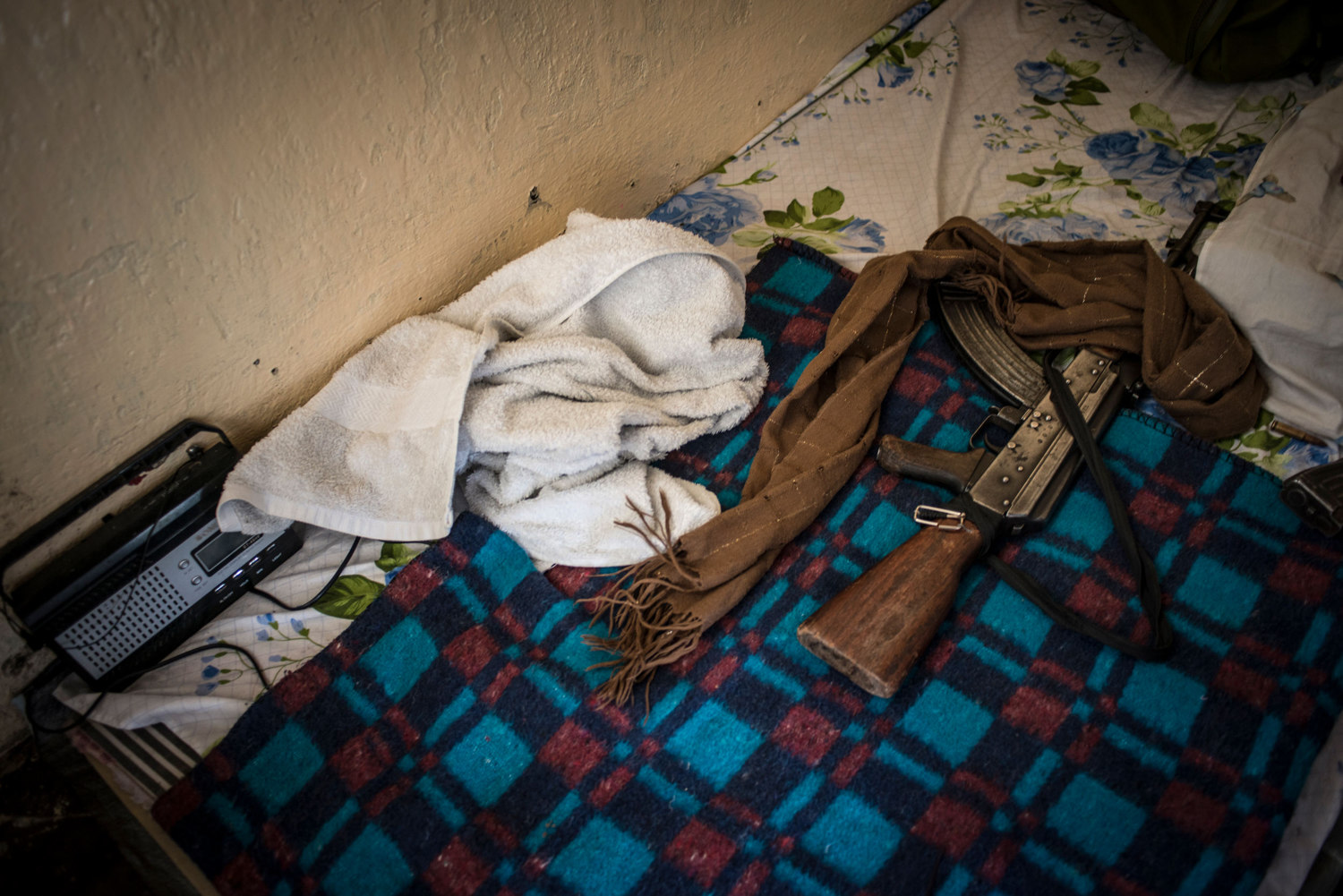  On Solange's bed is a radio and a gun. The girls sleep with their rifles as they are trained to do.
 