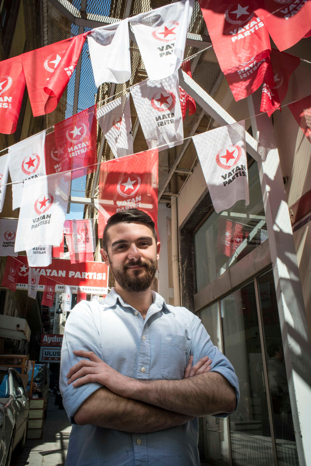  Engin Onder, Young Global Leader from Turkey. Photographed in Istanbul in front of the political flags for one of the parties running in the general election on May 5th 2015 for TIME Magazine. 