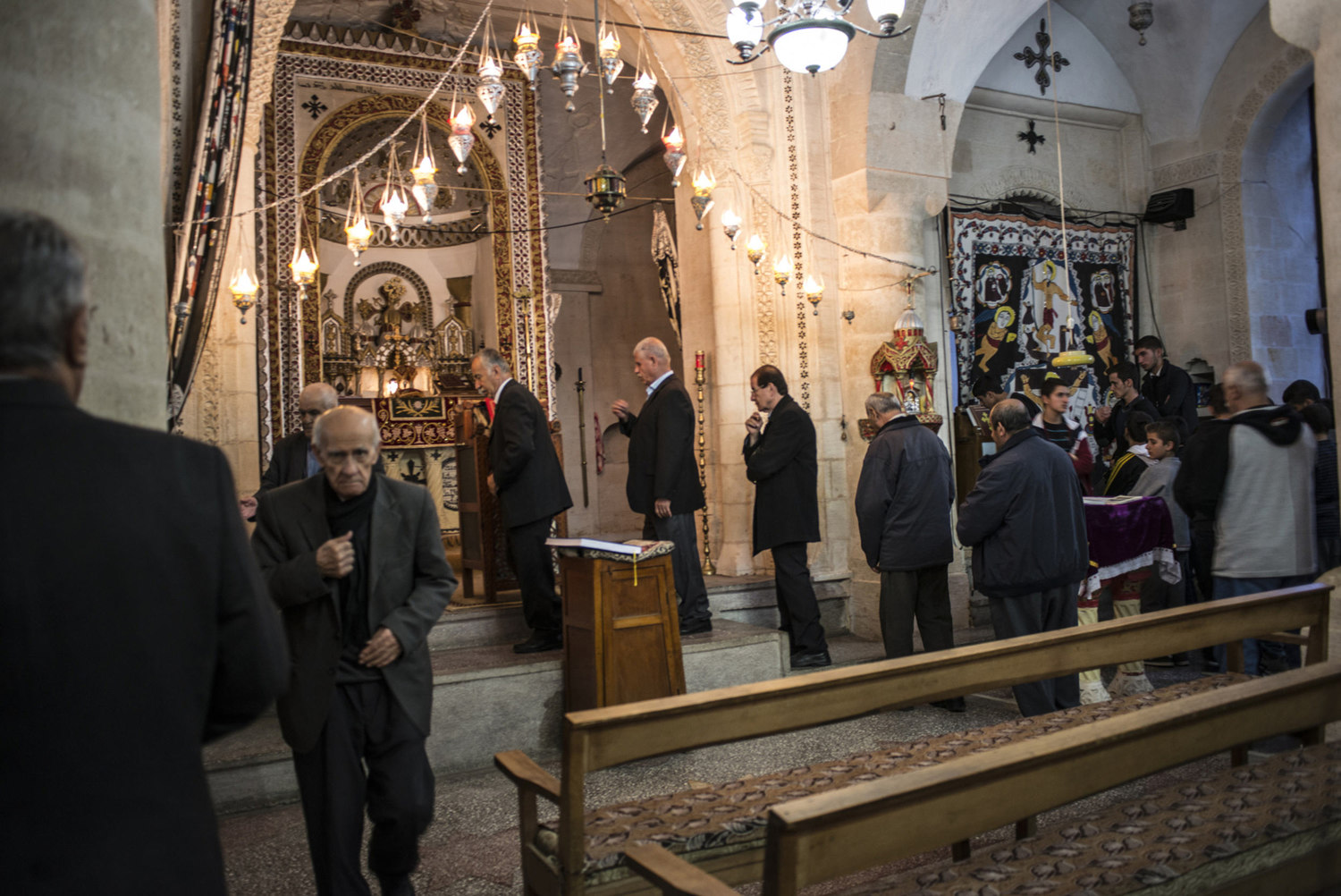  A church service at Mor Barsaumo church on October 31st, 2014.

The Mor Barsaumo church is over 1,500 years old and was renovated in 1943. It is located 21 Şen Caddessi in Midyat, Turkey. 