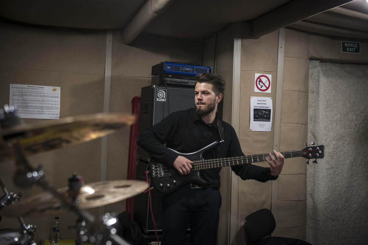  Yevhen Revko, 22 Bassist in Urban FM (center) practices with his band. 