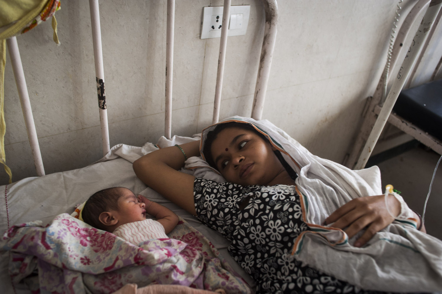  Jyoti and her newborn daughter who she will maybe name Rohini at the Gurgaon Hospital outside of New Delhi, India, where- defying statistics more girls are born than boys. Up to 50 million girls and women are missing from India's population as a res