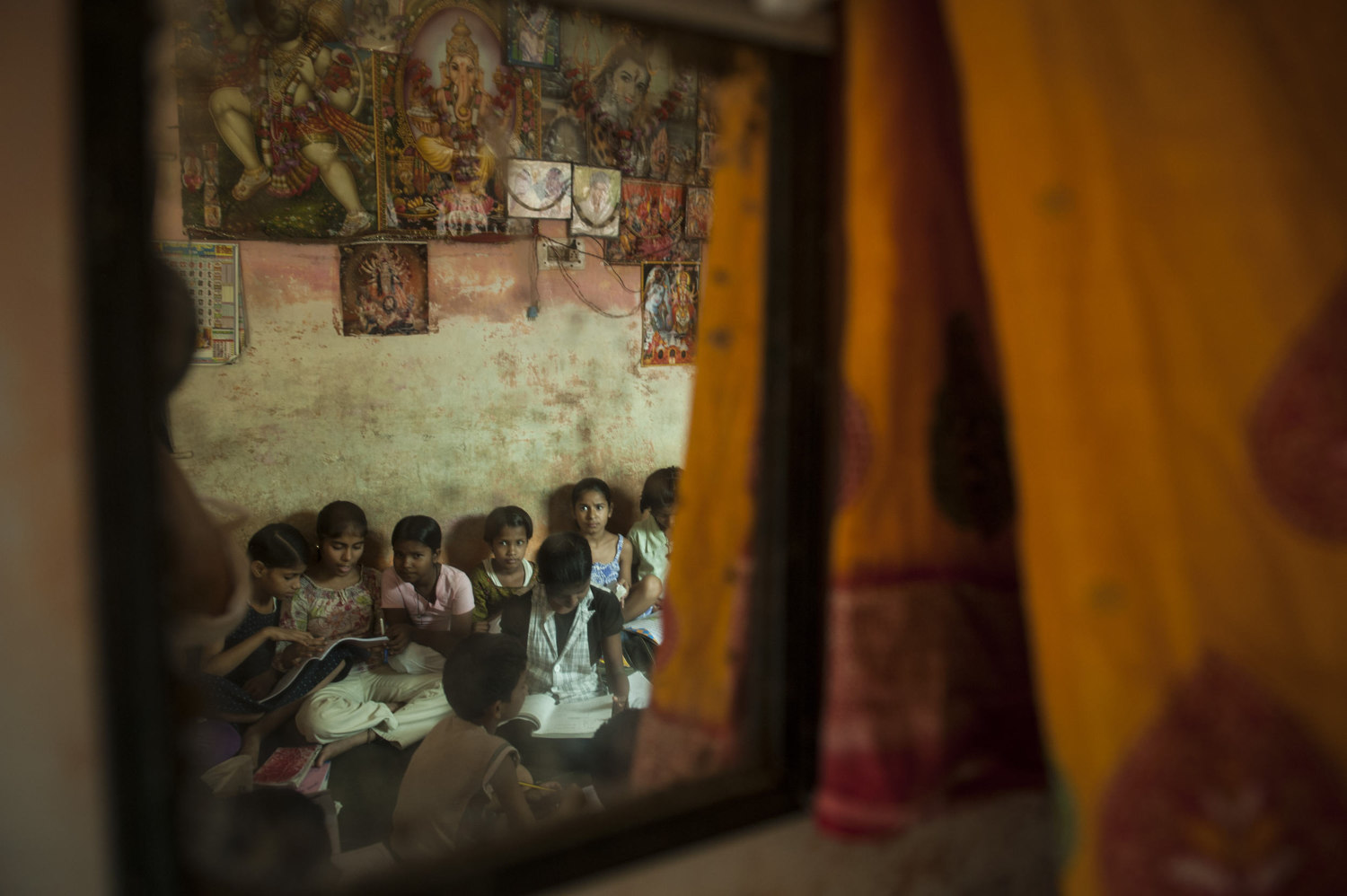  At the Sadnha Institute Center in Mullahera- a make shift after school program run for the children of migrant workers there are about 100 kids taught in five shifts. The school is run by Sadna and her husband, who notes that there are mostly boys d