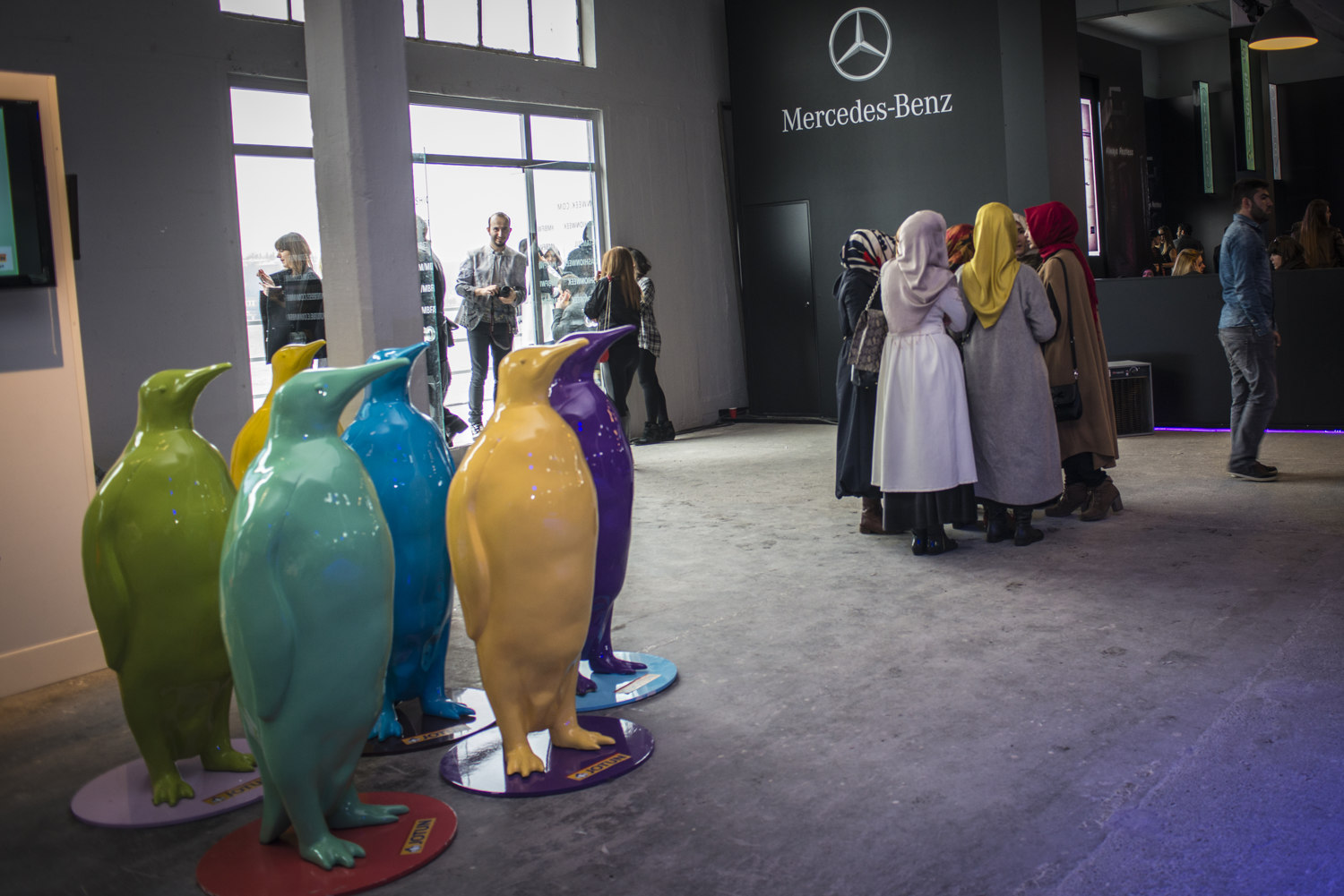  At Mercedes Benz Fashion week a group of women wait to enter the shows in 2014.  