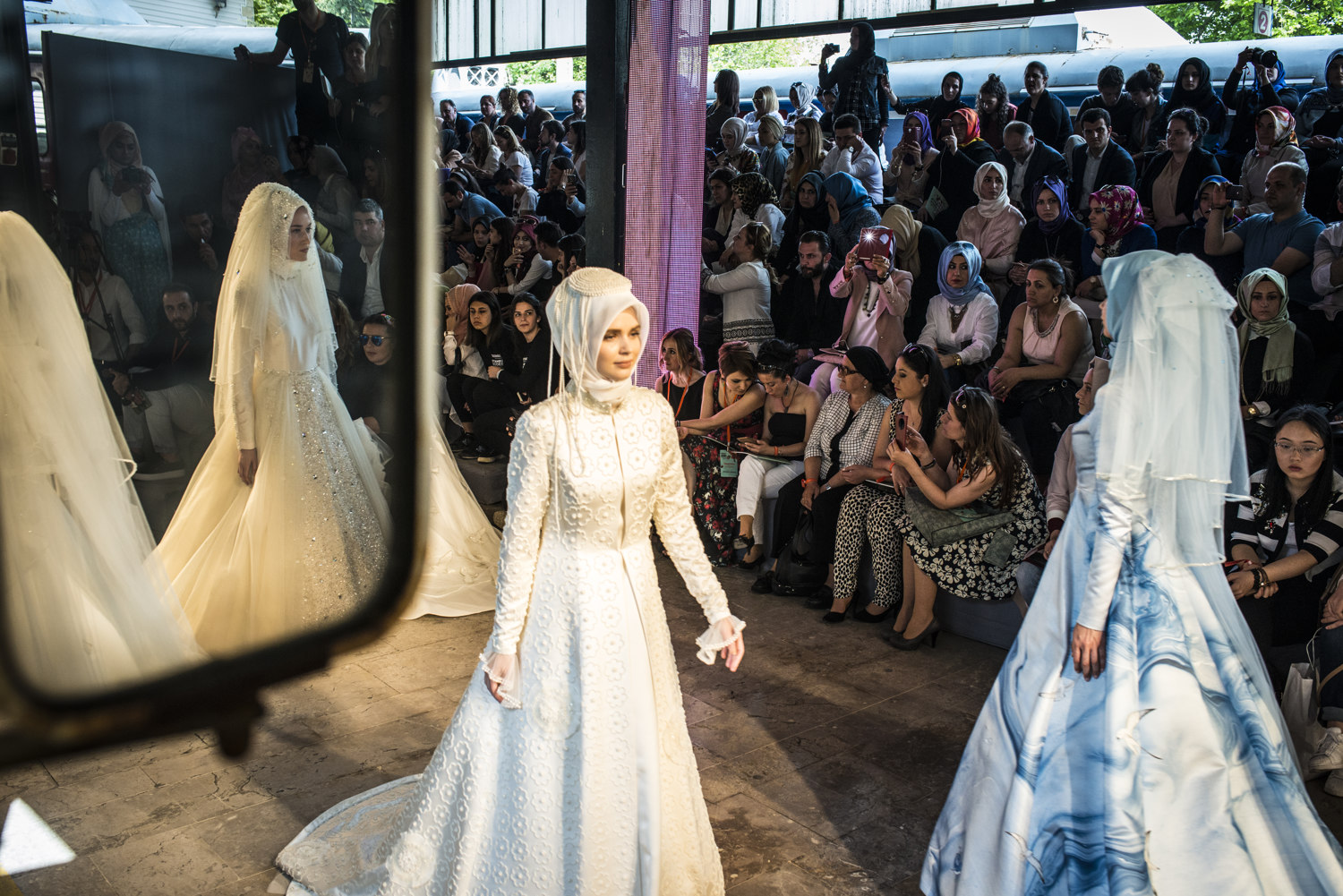  Runway shows at the first day of IMFW. 

Images from the first day of Modanisa's Istanbul Modest Fashion Week which takes place at Haydarpasa train station in Istanbul, Turkey on May 13th, 2016. 