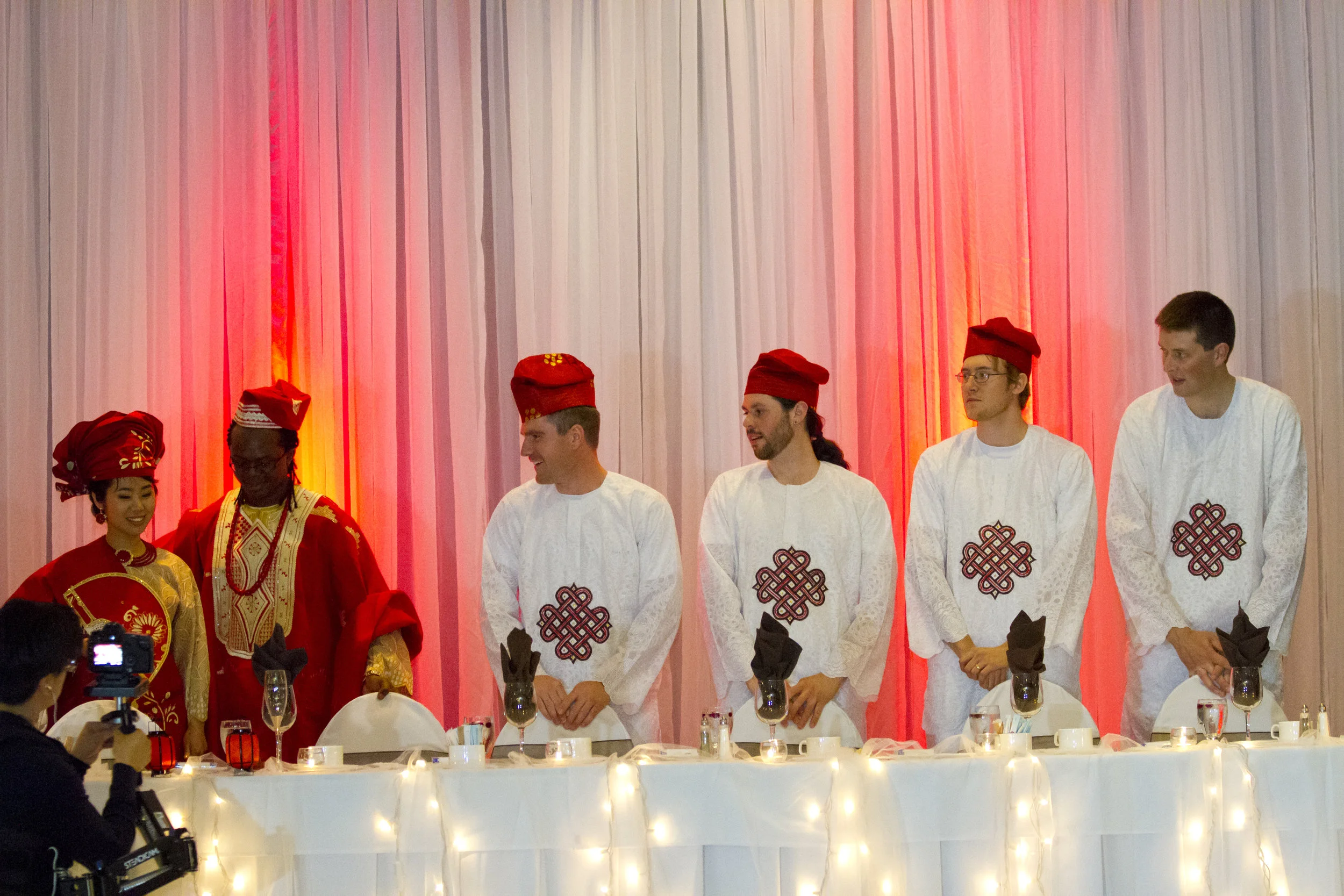 For the reception - the groomsmen wore African attires