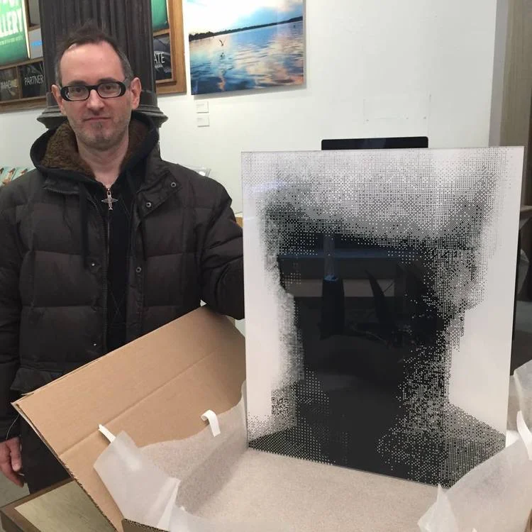 Gary picking up a piece from his Diety 1 series