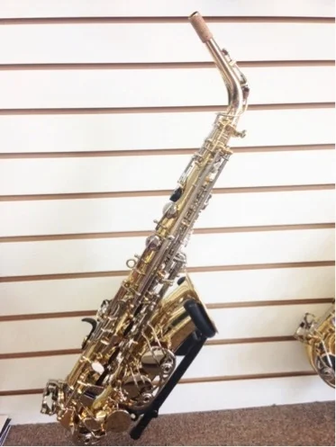Selmer AS400 Alto Saxophone This saxophone has a rose brass neck and a full rib design with double bracing. Equipped with an angled stack for easier reach. Call for pricing.