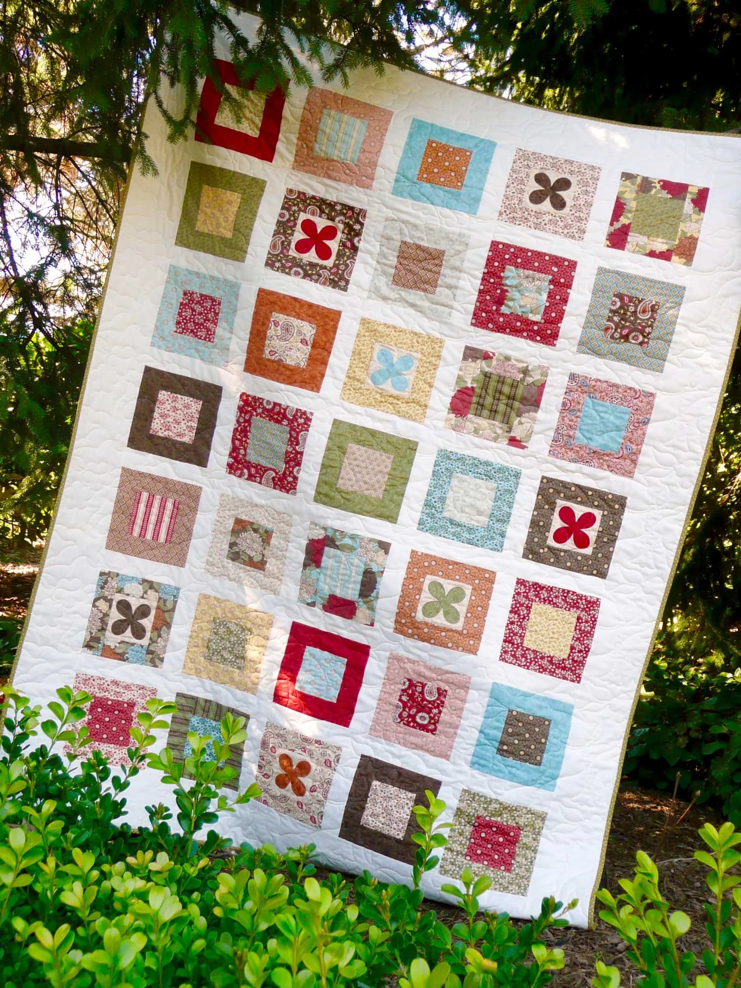 'Simply-a-Bloom' layer cake quilt
