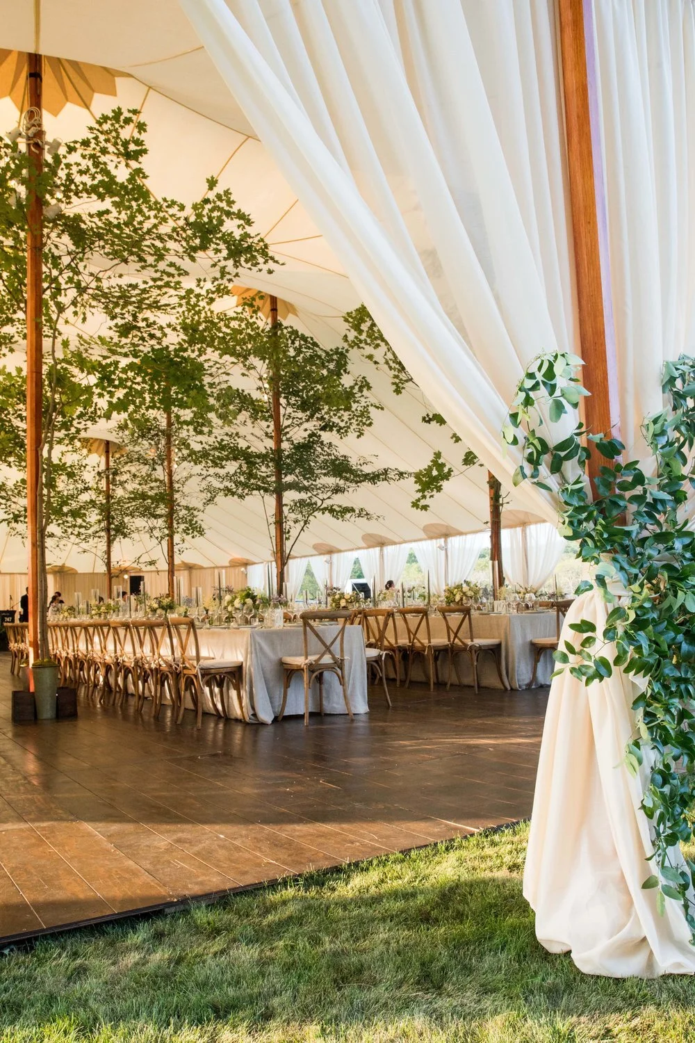 KDJ-Botanica-august-wedding-tent-with-greenery.jpg