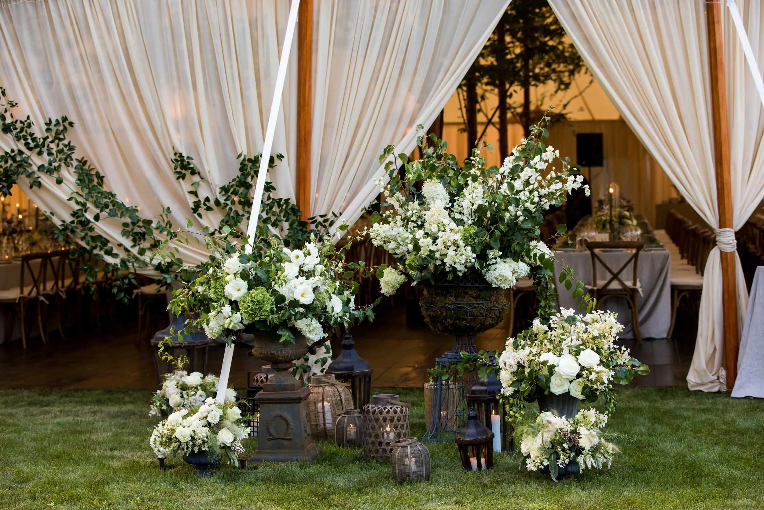KDJ-Botanica-wedding-tent-entrance-urn-arrangements.jpg