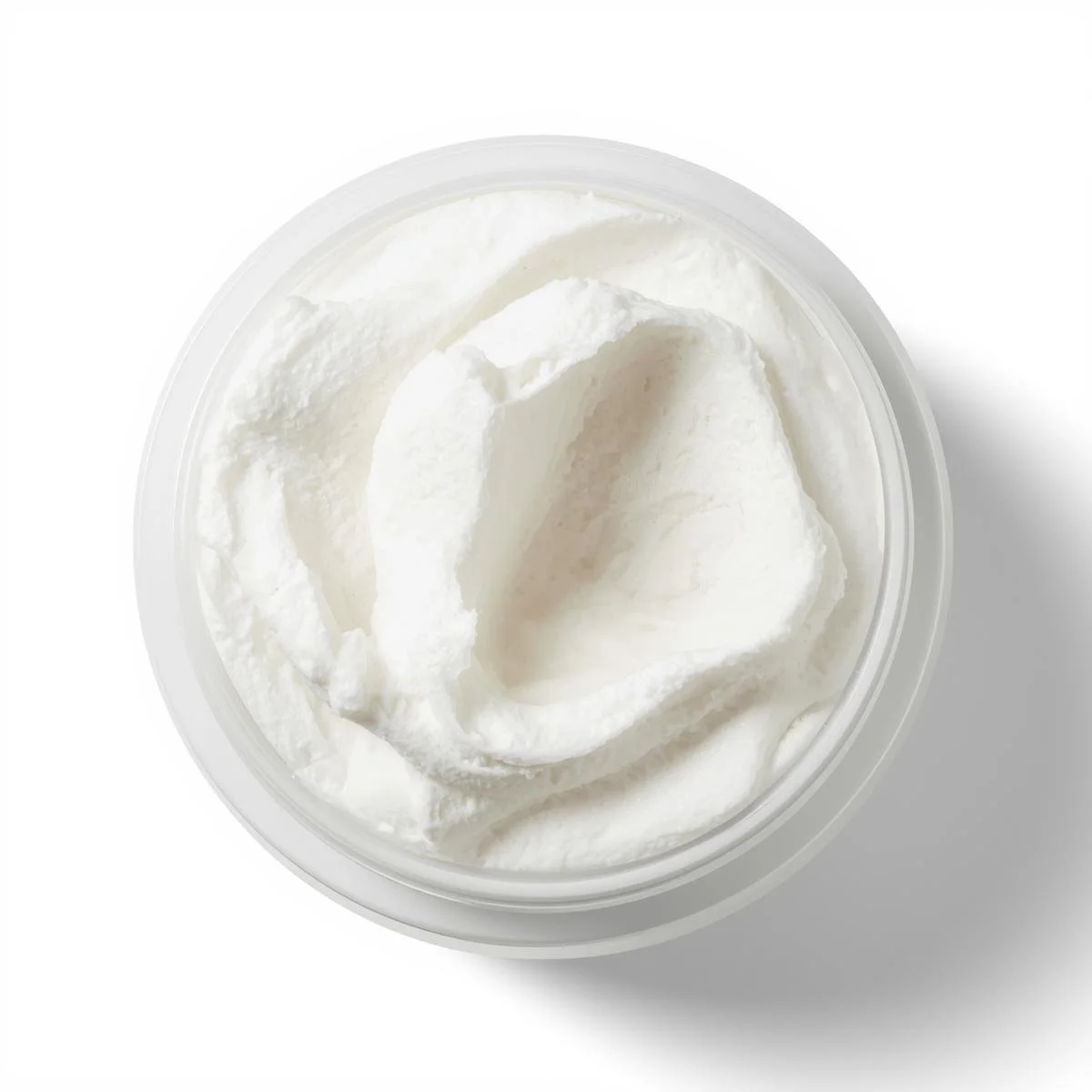 A top-down, slightly angled side view of an 8oz white, straight-sided round PET plastic jar, filled with fluffy white whipped soap, creating a luxurious texture. The packaging conveys a professional and u (1).jpg